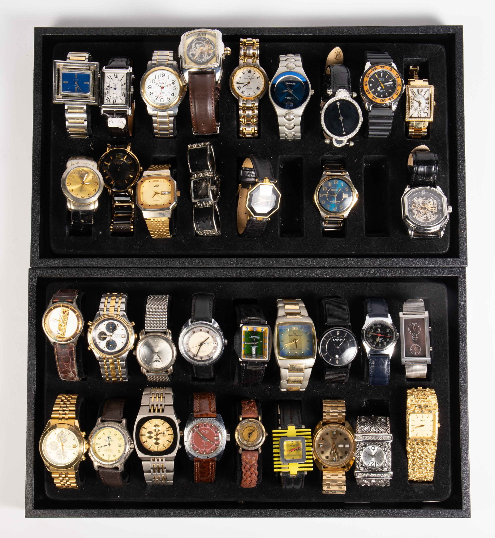 34 Mens' Watches, Some Vintage - Citizen, Gruen.: The lot contains 34 watches, mostly quartz. The other watches included are Rotary Elite reverso, Auguste Galan skeleton, Seiko Sport, Versailles, Claude Valentini La-Zoer, CG, Royal Dynasty 17 jewels,