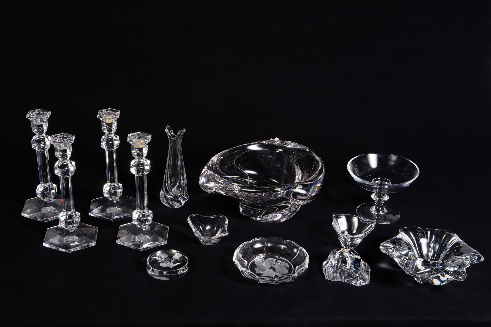 Lot of Val St. Lambert & Daum France Crystal.: The lot includes candlesticks, bowls, vases, and paperweights. Overall, the items look to be in nice condition. The candlesticks still have some wax residue. The large Val St. Lambert bowl is signed b
