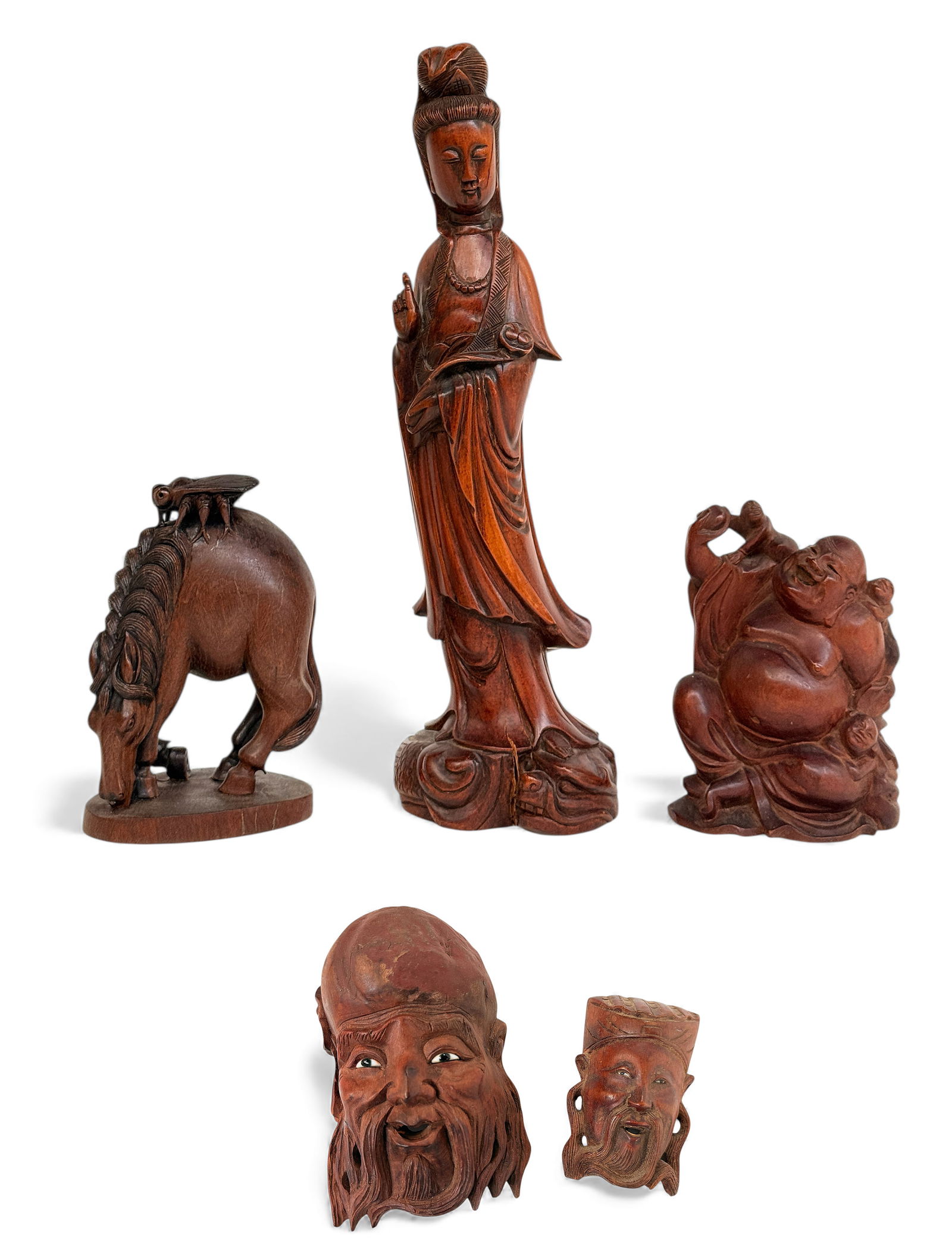 5 Chinese 20th Century Carved Boxwood Figurines.: The lot includes a Guanyin figure (has multiple cracks and some wear / losses), a Buddha figure, a horse figure (has crack), and two masks or face carvings. All of the items are in good overall condit