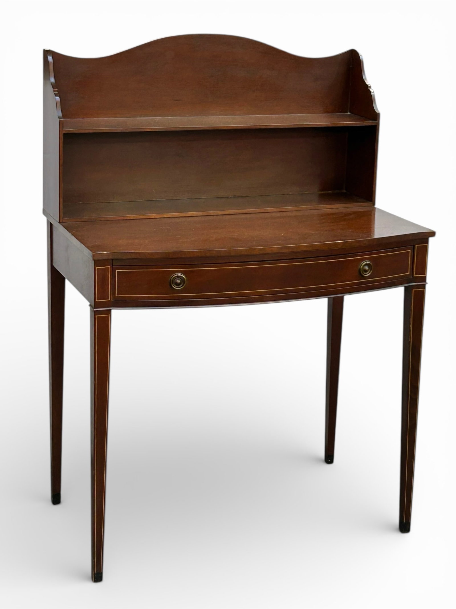 Mahogany Federal Style Writing Desk.: This small desk has a shelf and a single drawer. The drawer has a built-in holder for writing utensils. The piece is in good overall condition, with minor scratches and scuffs. It measures 32" wide, 1