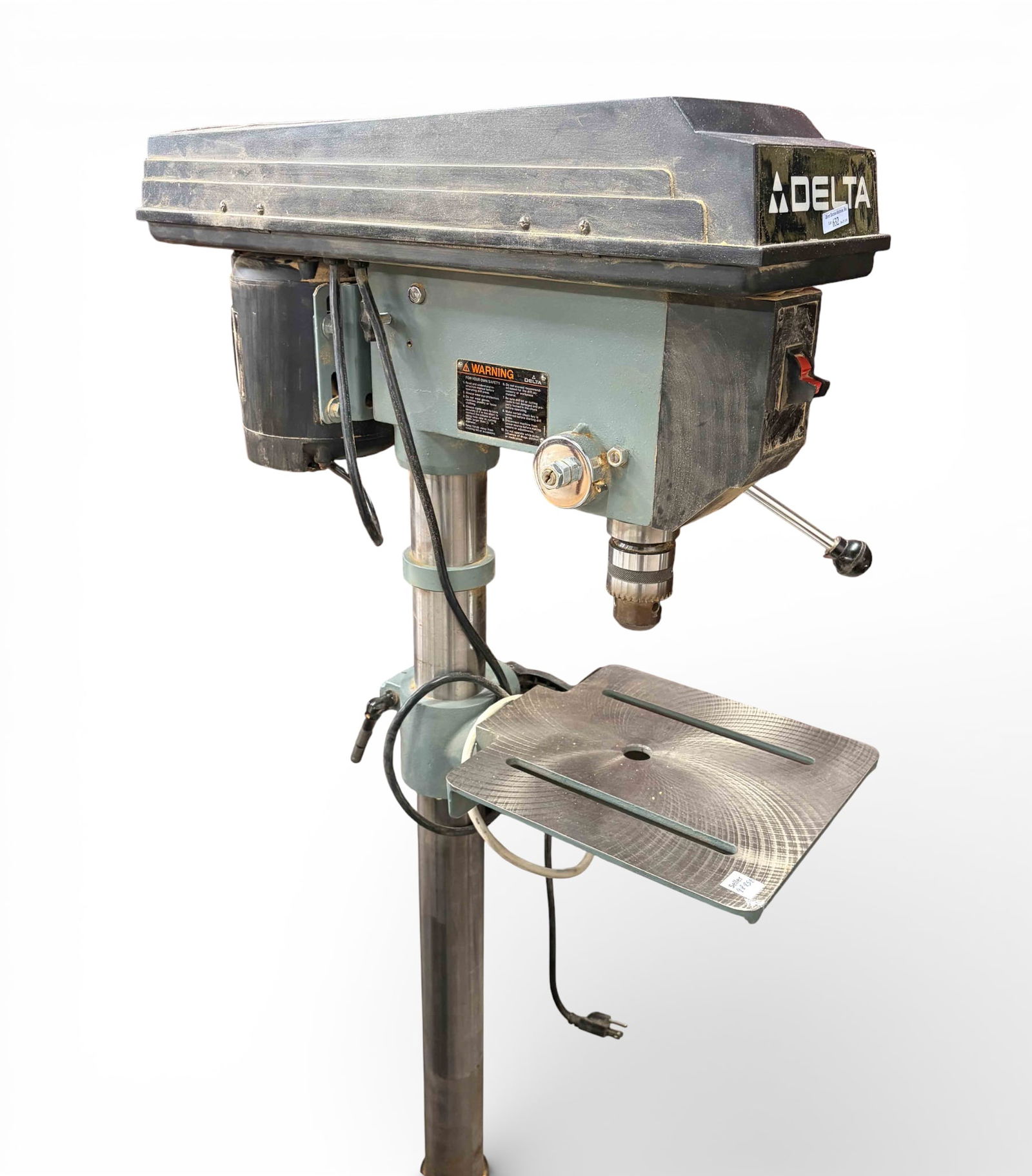 Delta 14" Standing Drill Press, Model 14-070.: The Delta adjustable drill press is model number 14-070, and serial number 9227. It measures 64 3/4" x 12 1/2" x 25 1/2". It works. There are scuffs, scratches and stains on the piece. Otherwise, it i