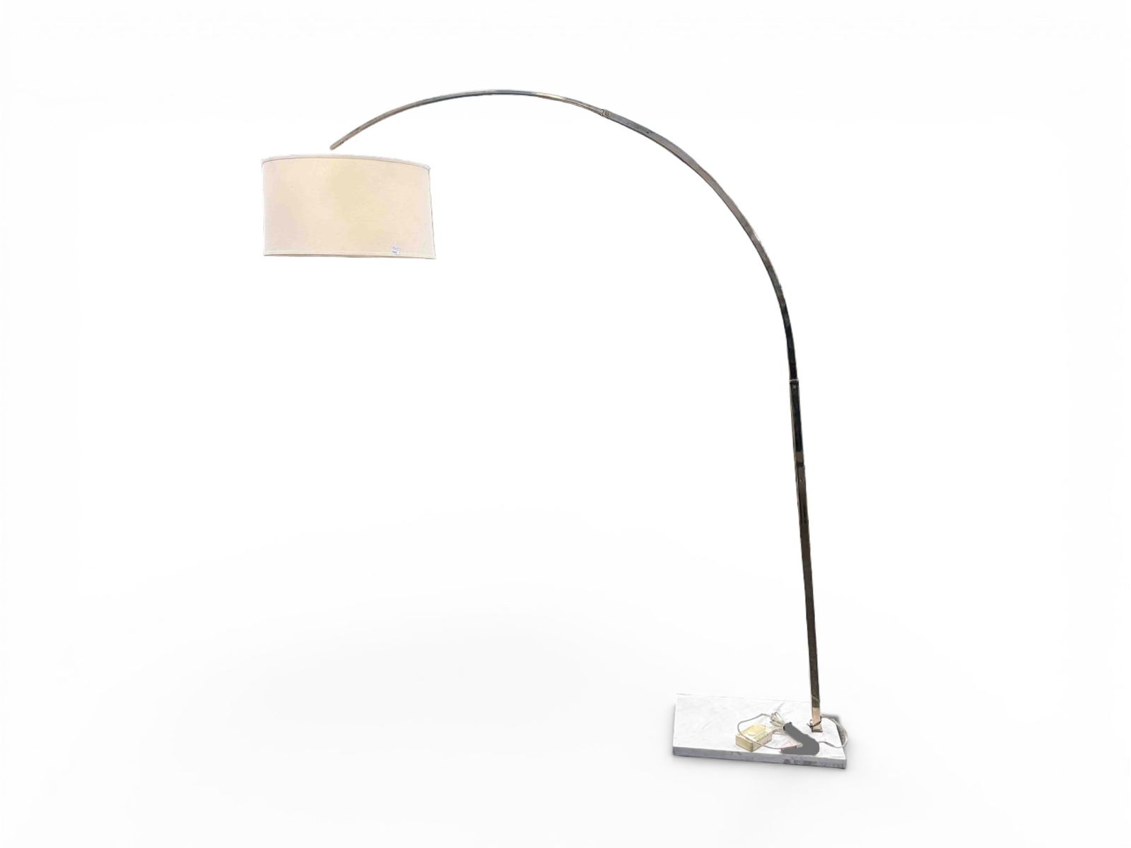 Chrome and Marble Arched Floor Lamp.: The contemporary 2-light floor lamp has a rectangular white marble base, a chrome post, and an off white linen drum shade. The on/off switch appears to have a dimming mechanism. It measures 78 1/4" x