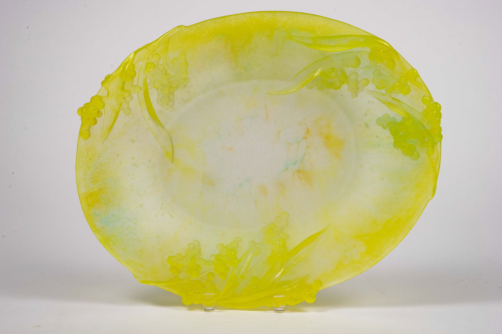 Daum France Pate de Verre "Mimosa" Platter.: This uranium glass yellow platter is covered with small clusters of flowers and long leaves. Overall, it looks to be in very nice condition. The platter does glow under blacklight. It measures approxi