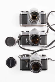 Three Pentax M42 Cameras with Lenses.