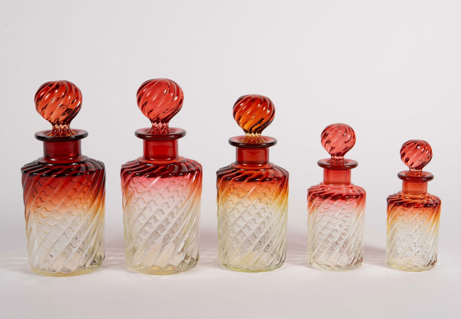 Set of 5 Antique Baccarat Amberina Swirl Bottles. (1 of 6)