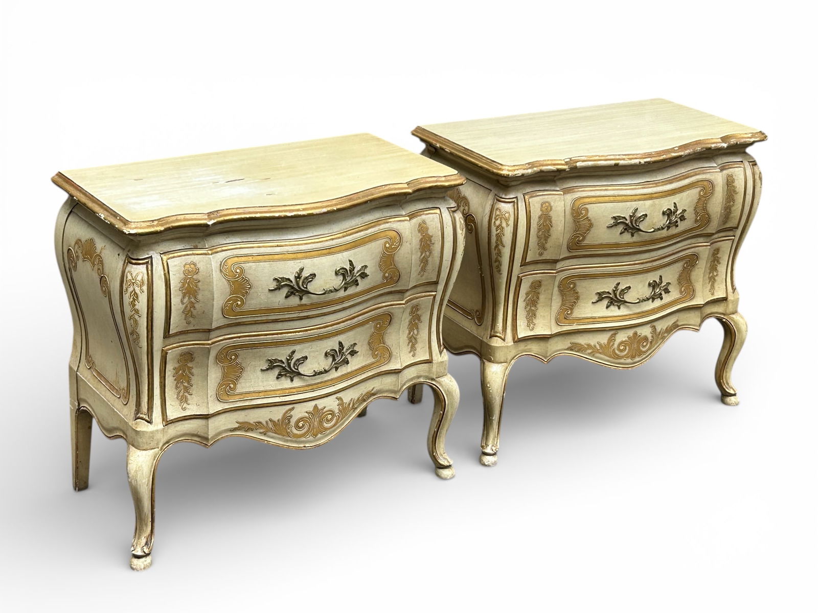 Pair of Widdicomb Bombe Chests.: These Louis XV style bombay chests, commodes, or nightstands have bevelled edges, serpentine fronts, two drawers, and gilt hardware. Each one measures 30" wide, 17" deep, and 27 1/2" tall. There are s