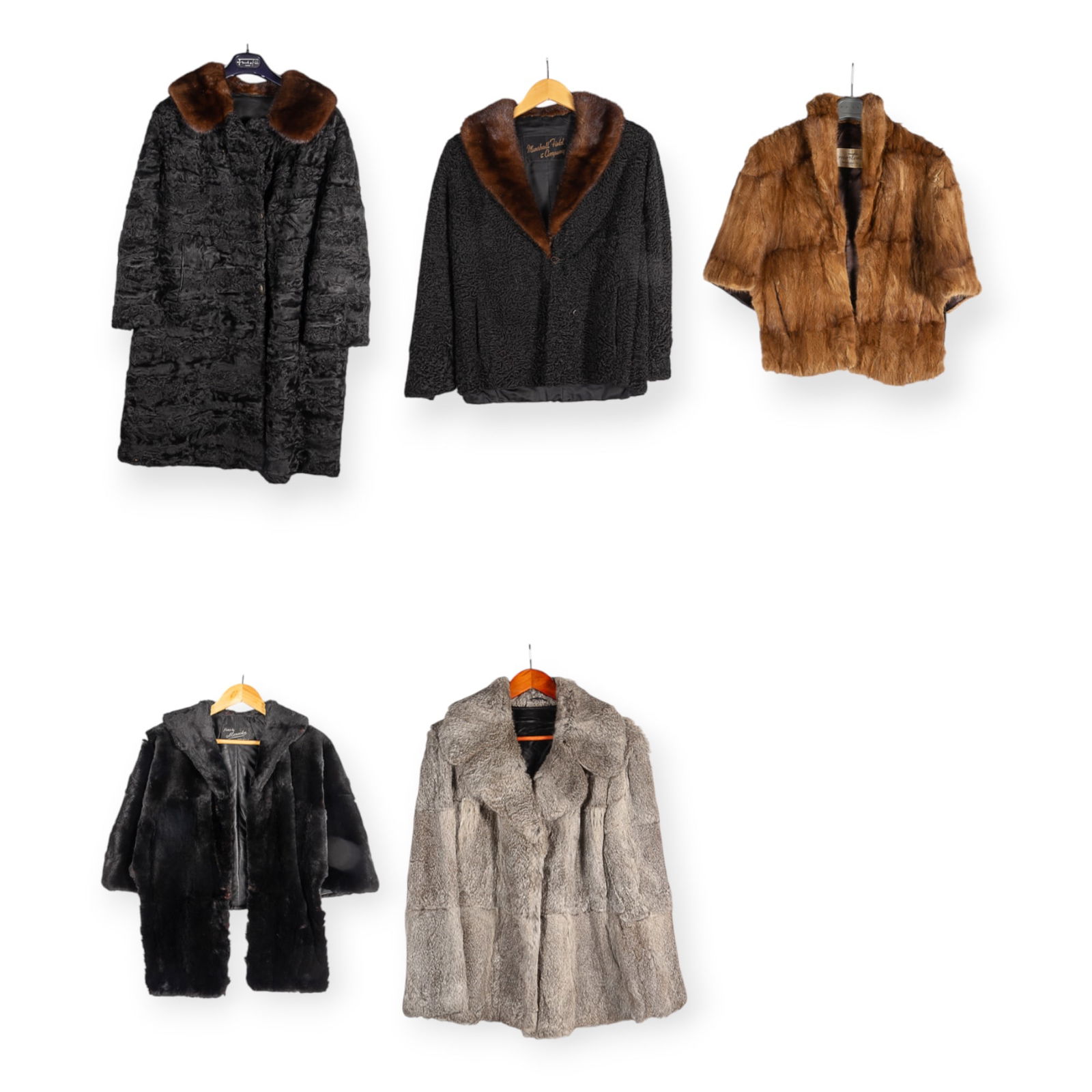 Lot: 5 Pcs. Ladies' Furs- Coats & Cape.: This lot includes two Persian lamb coats with mink collars (one from Marshall Field's), a rabbit fur coat, a dark sheared mink cape, and a brown mink cape. The darker mink cape has a hole in the right