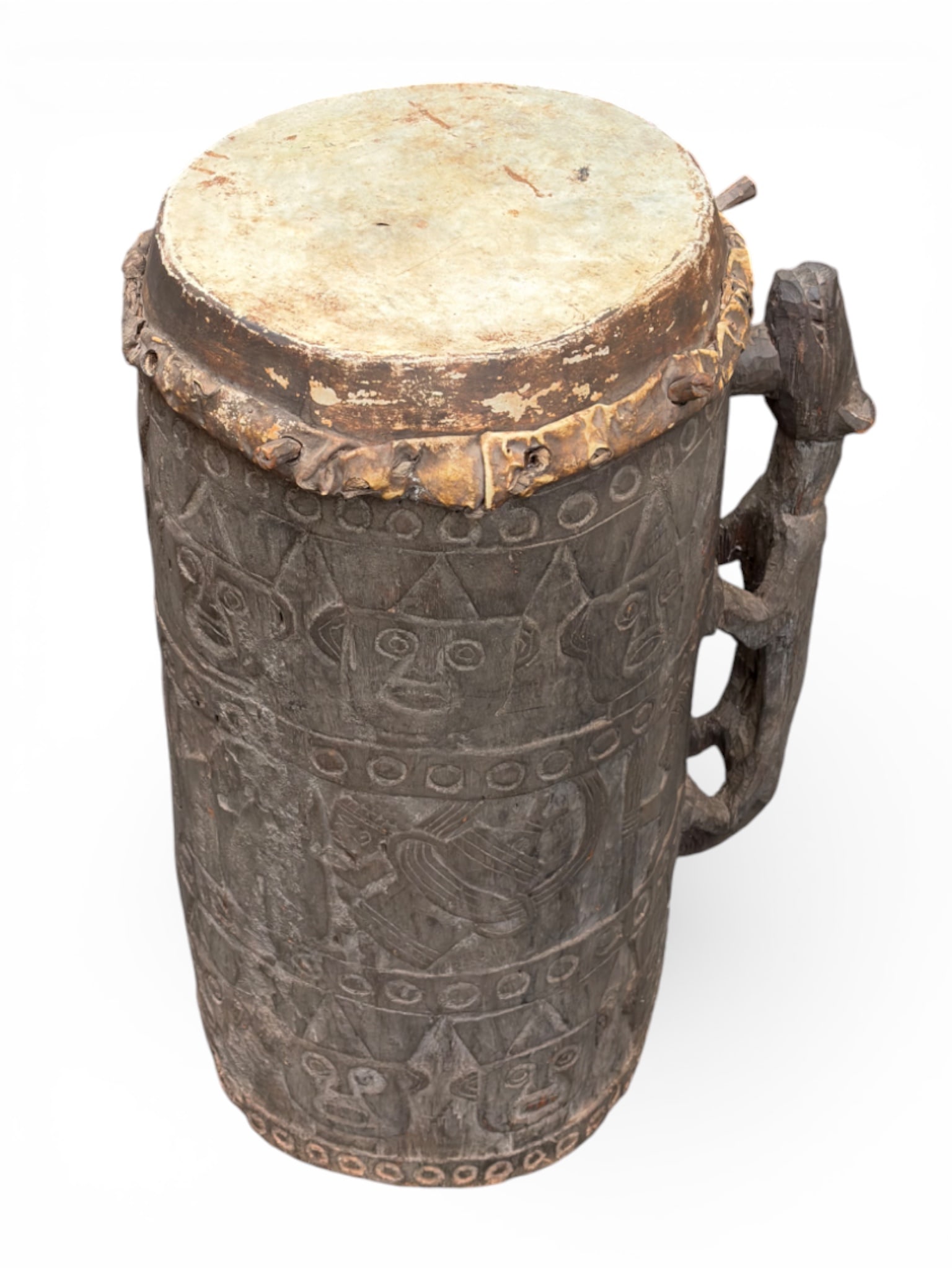 3' Bamun African Drum w/ Animal Carving.: This carved ceremonial drum from Cameroon was originally purchased in 1981, and looks to be in overall good condition. It has some signs of surface wear, and a small tear on the top. Overall, it looks