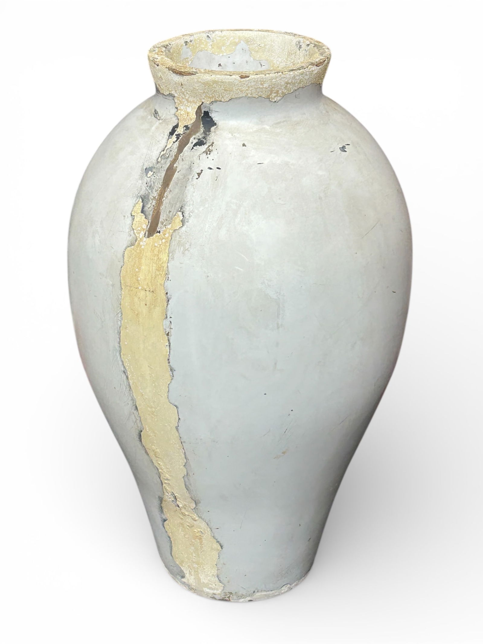 Large Fiberglass Vase.: The vase has a natural color and a distressed finish, with some flaking paint. It measures 38" tall and 18 1/2" wide. Third-party freight shipping or personal pickup is required. Please see our websit