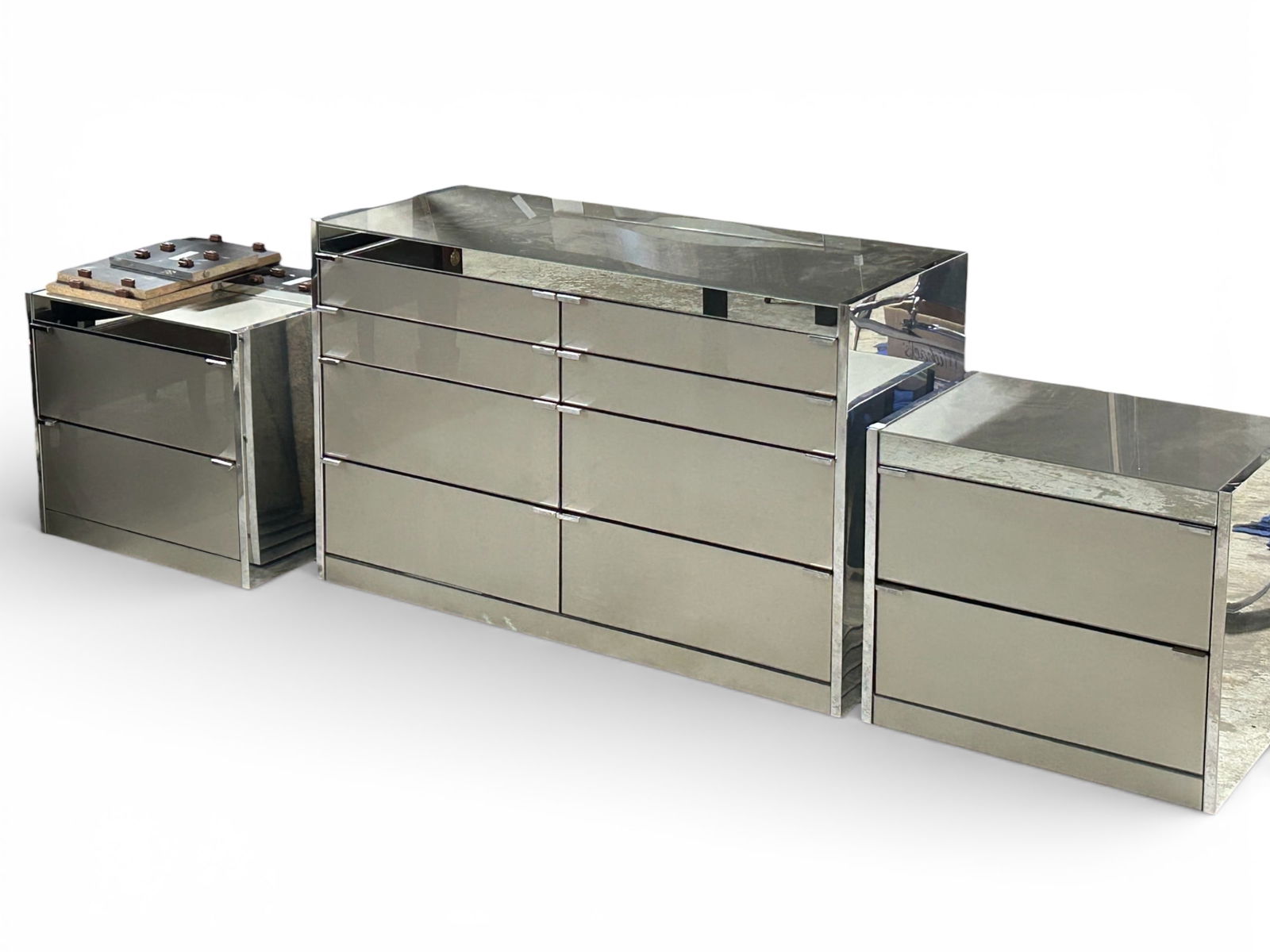 Ello King Bedroom Suite - Chrome & Mirrored.: The vintage bedroom suite was designed by O.B. Solie in the 1970's. The lot contains a king size "floating" bed frame with an extra wide headboard, which sits also behind the 2 nightstands. The lot al