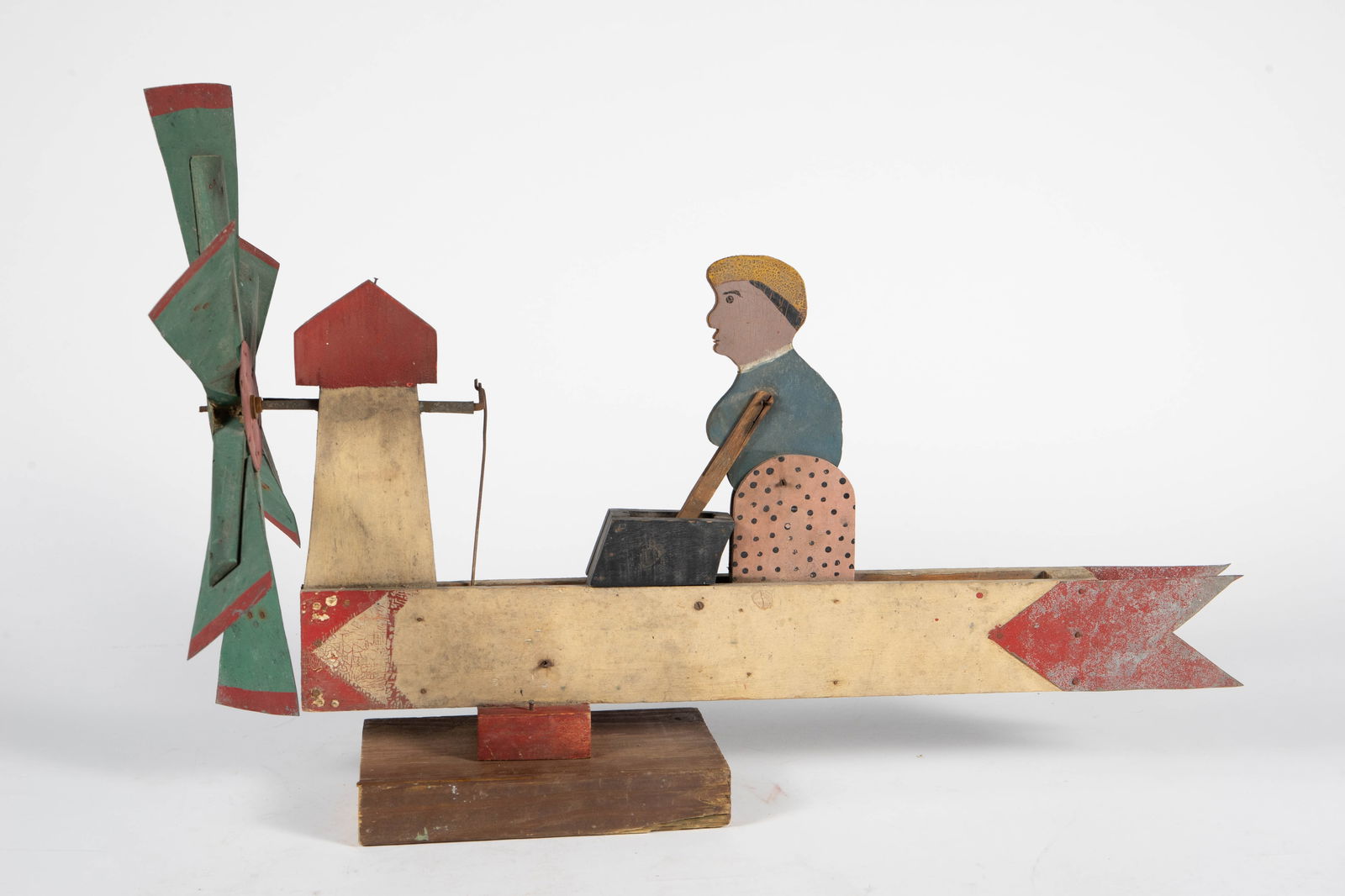 Antique Folk Art Whirligig of a Washer Woman.: The artist is unknown. It displays some signs of wear - paint loss, a chipped area, and dust. The dimensions are 25 3/4" x 13 3/8" x 17 1/4". In-house shipping is available. Please see our website reg