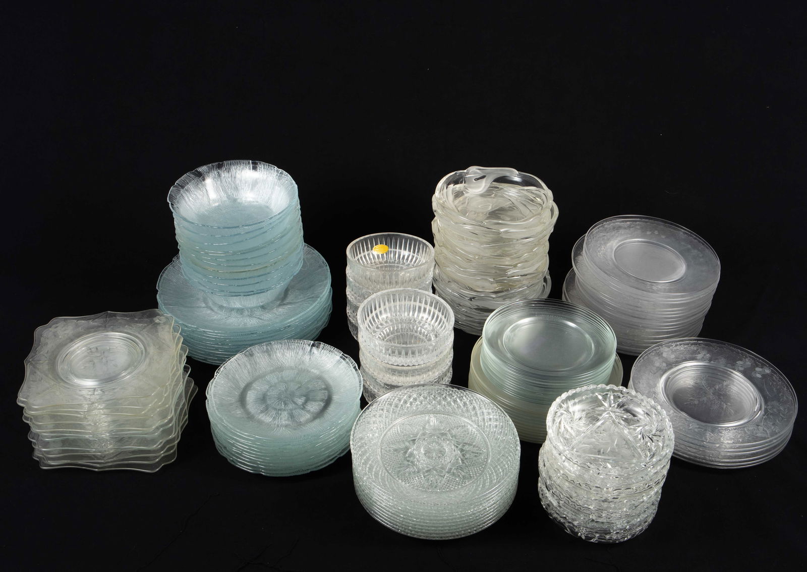 Lot Glass & Crystal Plates - Mikasa, Libbey, Etc.: The lot contains 131 vintage crystal or glass plates and bowls. The marks observed in the lot are Indonesia, Arcoroc France, and West Germany Lead Crystal. From Indonesia, there are 12 dinner plates,