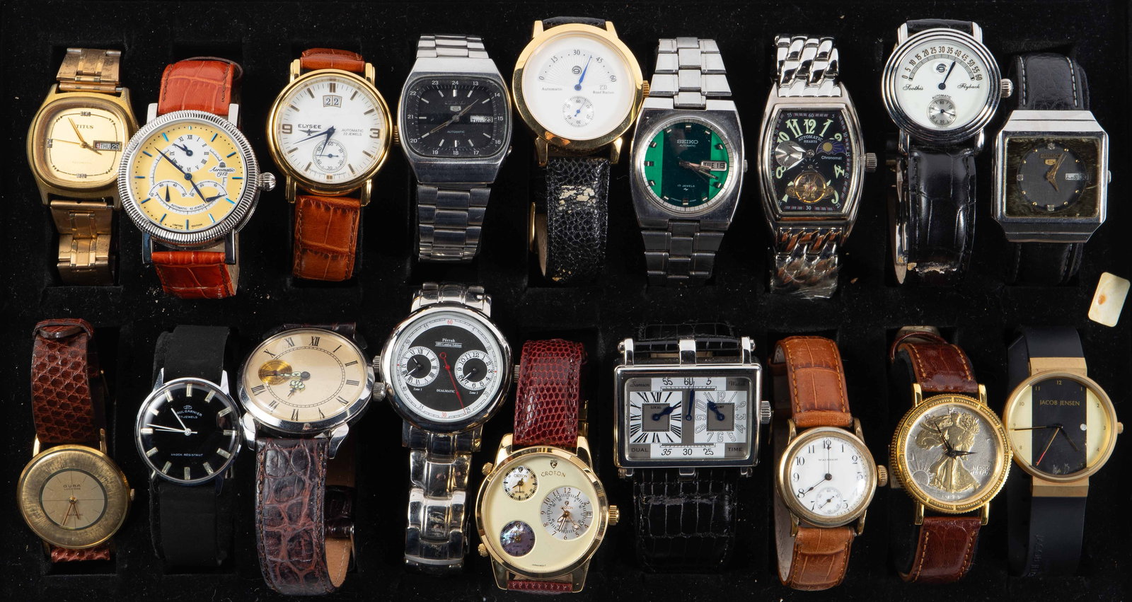 18 Mens' Watches - Elysee, Barton, Seiko, More.: The lot contains mostly automatic watches, some of them vintage. The non-automatic watches are Jacob Jensen, and a piece with a 1944 walking liberty half dollar face. The automatic watches are Titus,