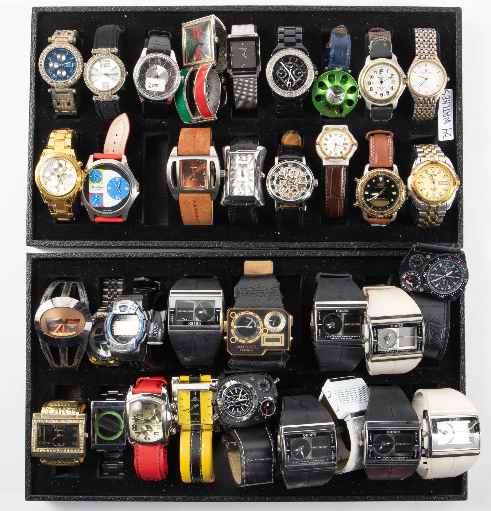 34 Mostly Quartz & Digital Watches - Oshen, Belay.: The automatic watches included are an Orkina skeleton piece, and a Tressa Lux Spaceman. They both tick. The digital watches included are Oshen, Diesel 05 Bar, Generation Laser Watch, Orsen, and Philip