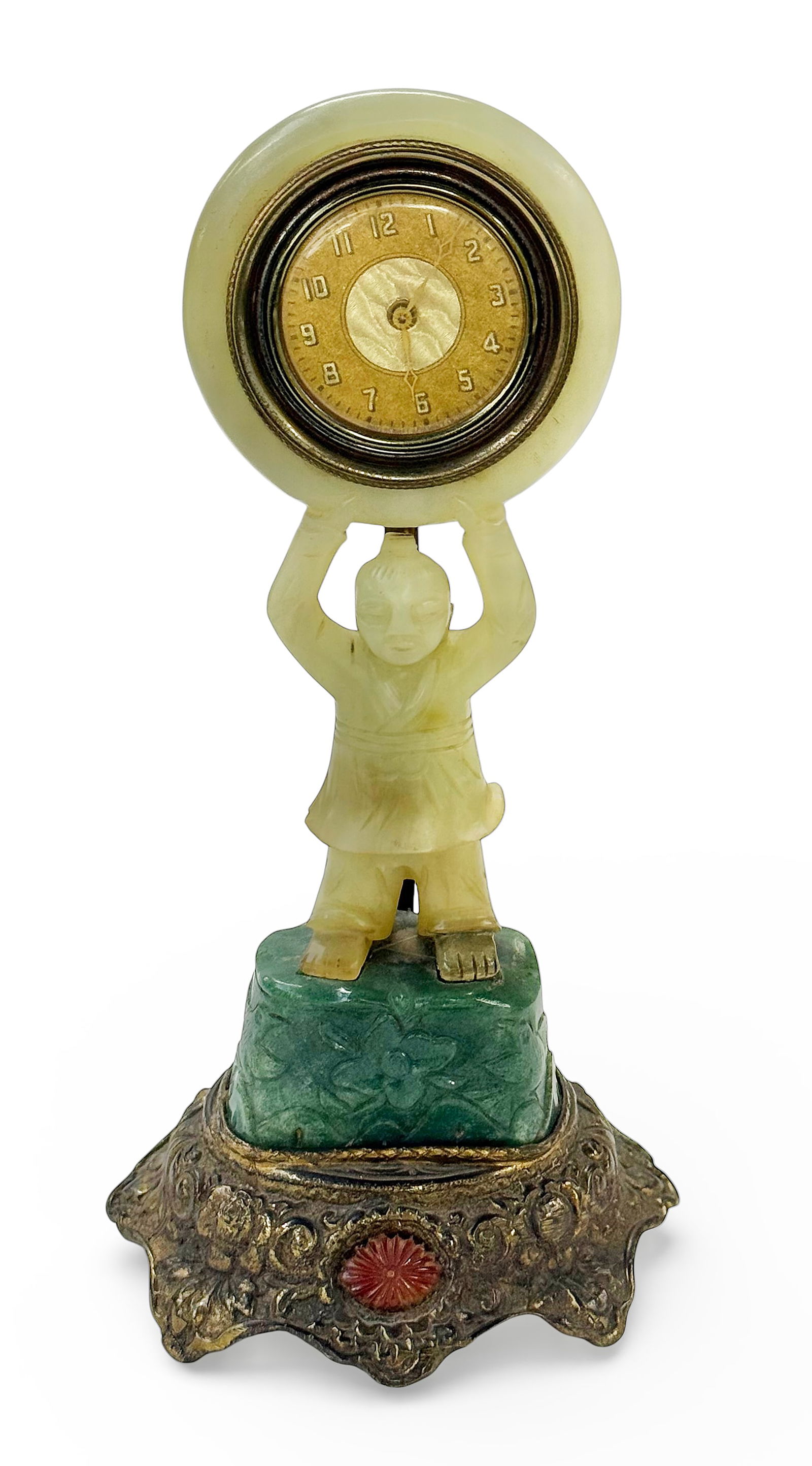 Early 20th Century Chinese Jade Carved Boy Clock.: The base upon which the boy stands is also jade, as well as a small carved embellishment which is inset into the metal base. The clock is marked "Silvercraft Specialty Co." - the clock's working