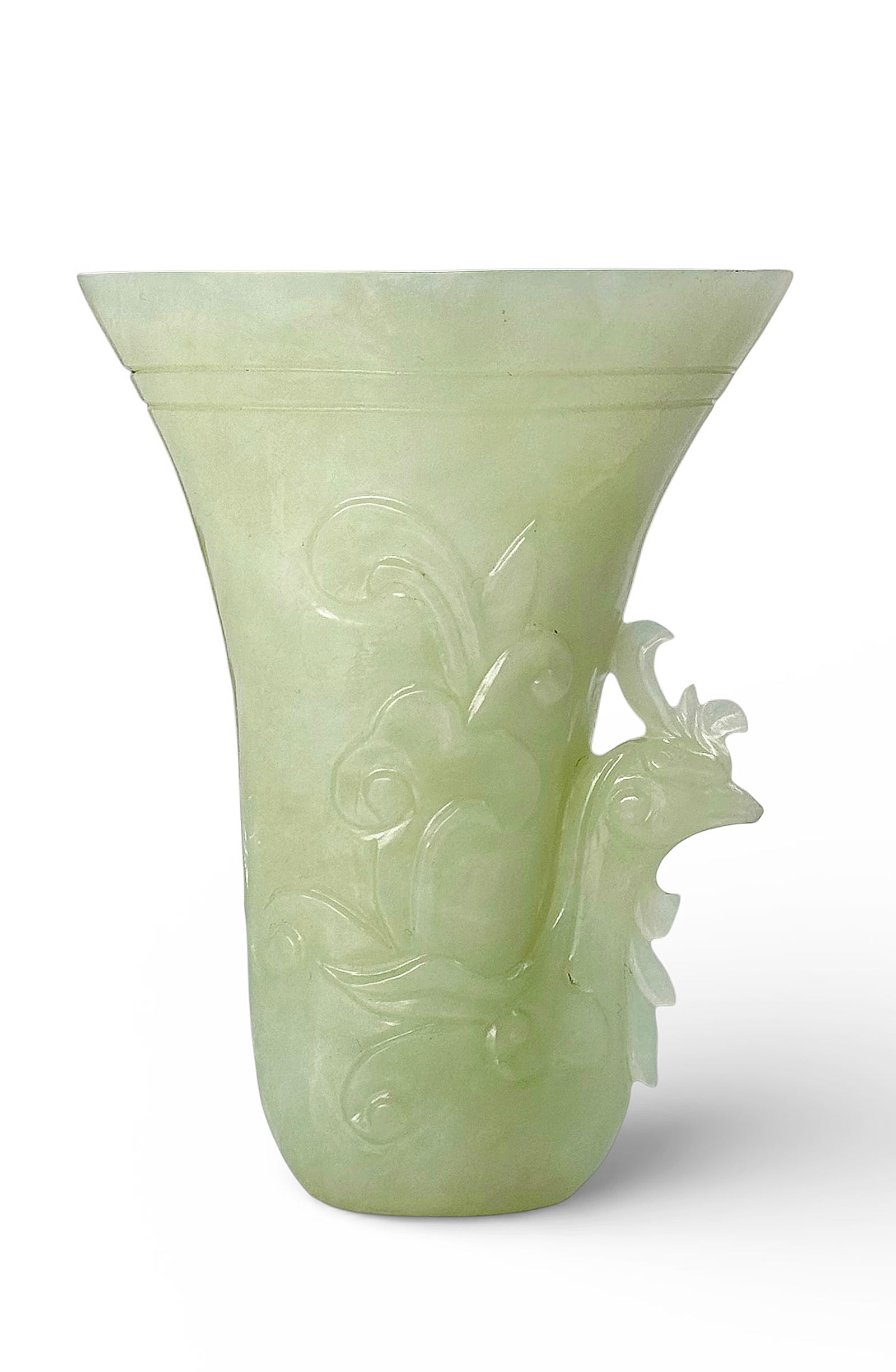 Carved Chinese Light Green Jade Libation Cup.: The cup has a phoenix head carving in it. It looks to be in good overall condition. It measures 4" tall, 3" in maximum width, and 1 3/4" deep. In-house shipping is available. Please see our website re