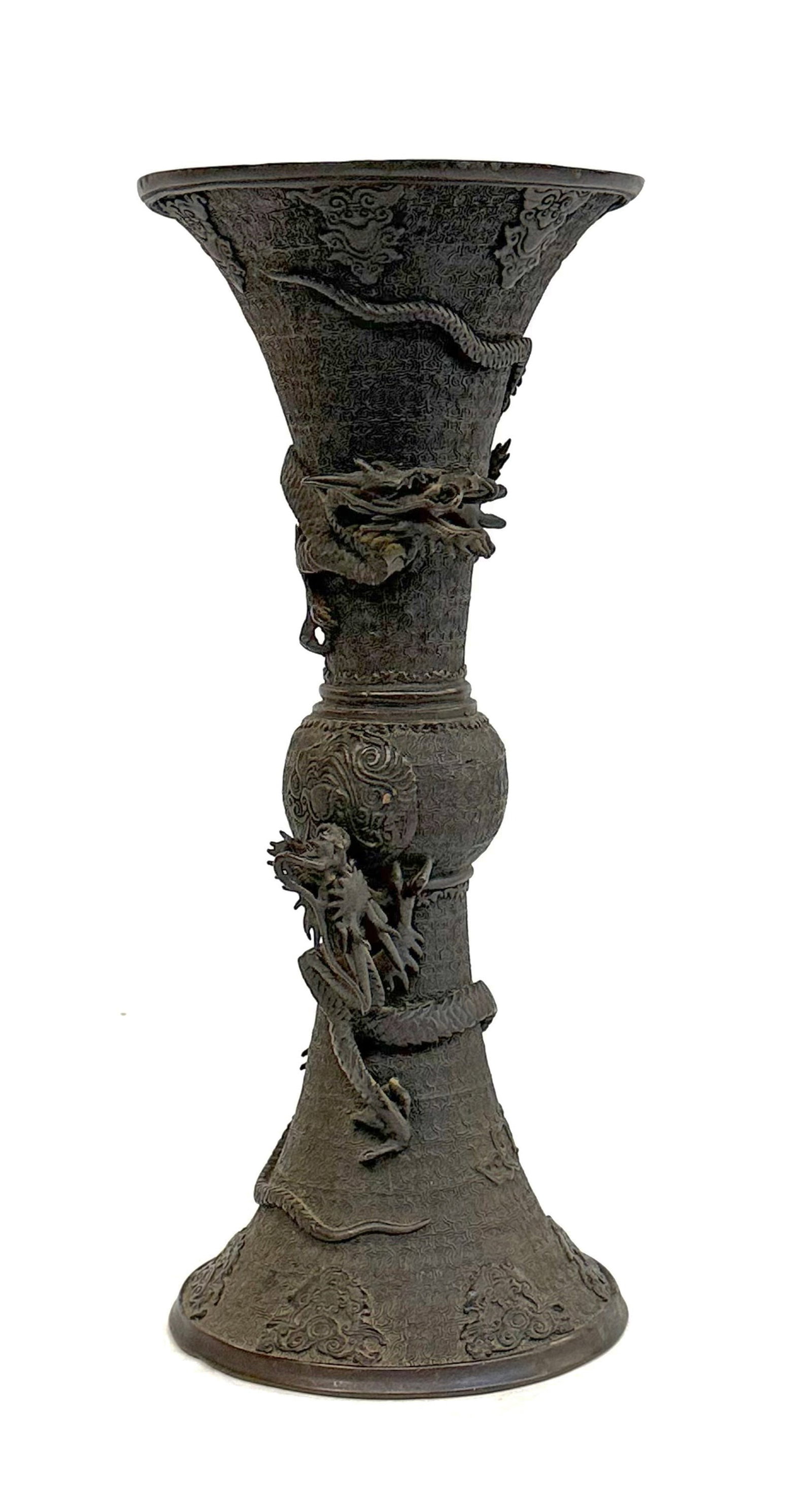 Japanese Meiji Period Bronze Dragon Vase.: The piece is slightly bent at the top, but is in good overall condition. It measures 14 1/4" tall and 6 1/4" in diameter at the top. In-house shipping is available. Please see our website regarding ou