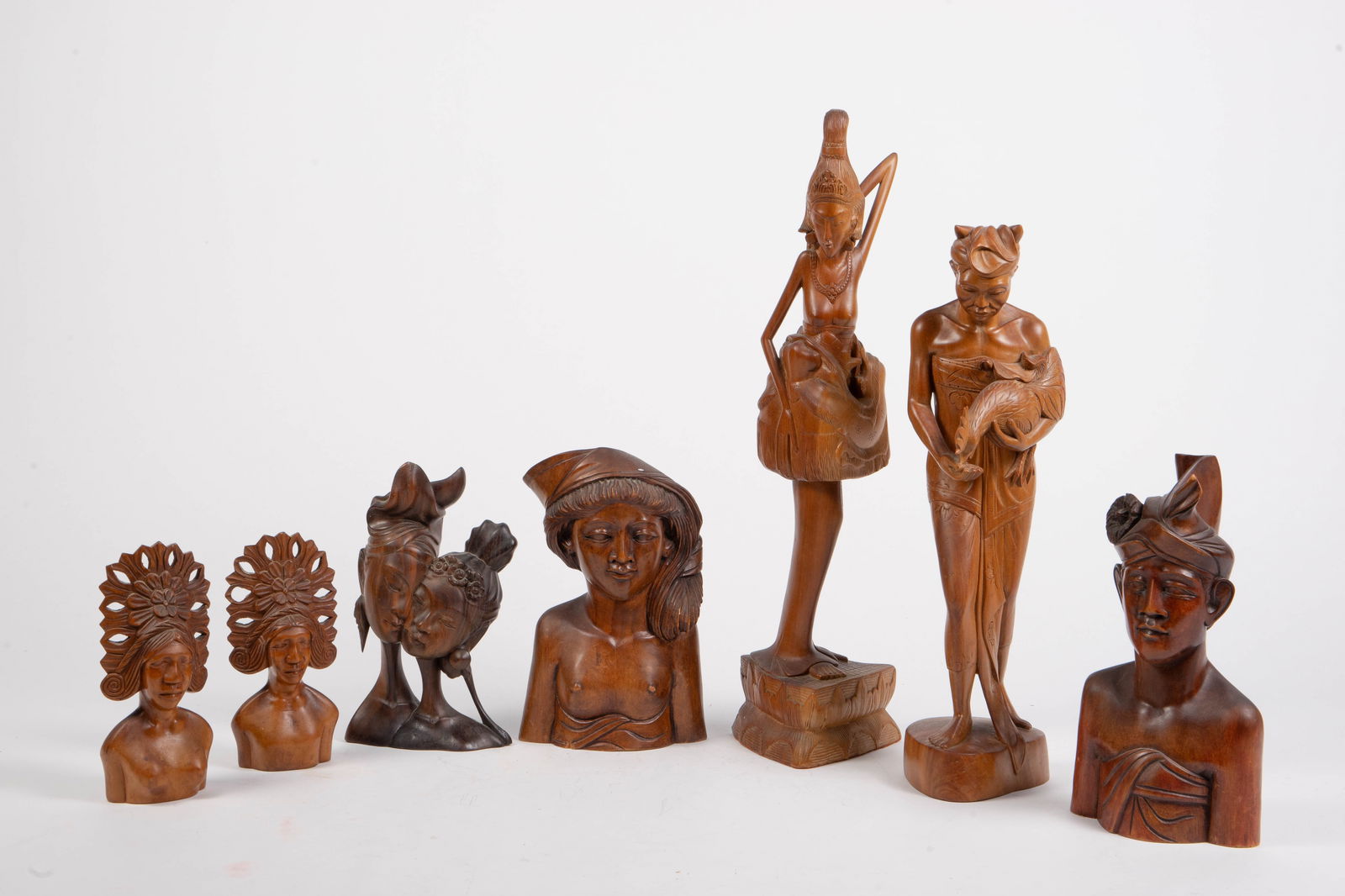 Lot of 7 Carved Wood Balinese Sculptures. (1 of 8)