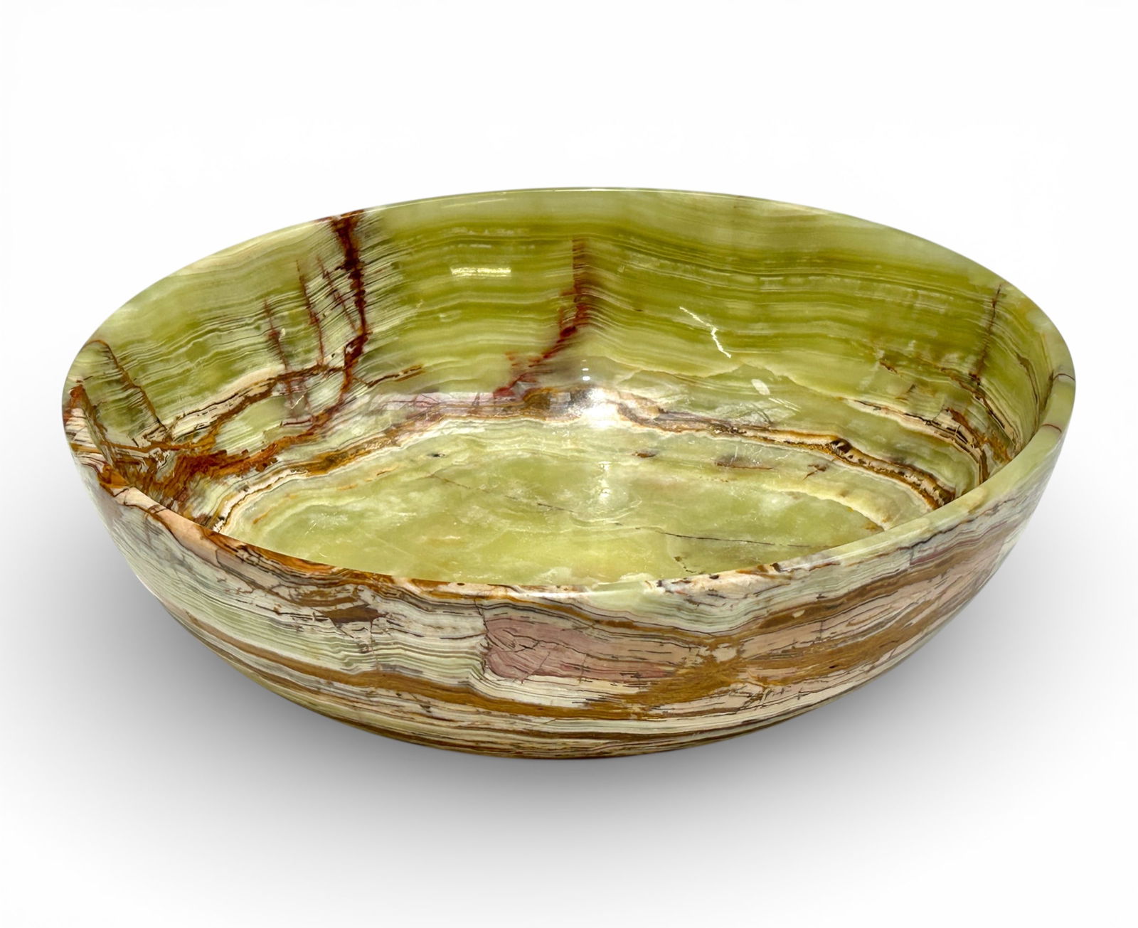 Green Onyx Centerpiece Bowl.: The carved green onyx bowl measures 11 7/8" in diameter and 3 1/2" tall. There are some scratches on the piece. Otherwise, it is in overall good condition. In-house shipping is available. Please see