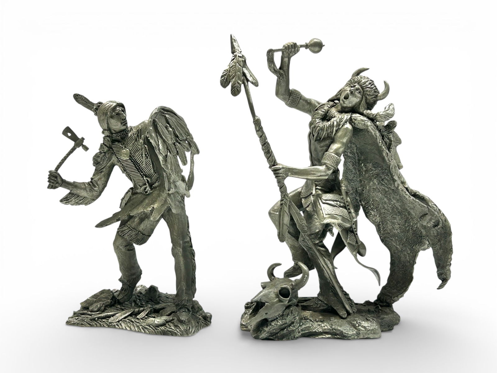 2 Jim Ponter Pewter Sculptures, Native Americans.: The lot contains 2 limited edition sculptures by Jim Ponter. The smaller piece is numbered 1214 / 4500, and titled Comanche Warrior, dated 1985. It measures 9 1/4" x 6 1/8" x 4 7/8". The larger piece