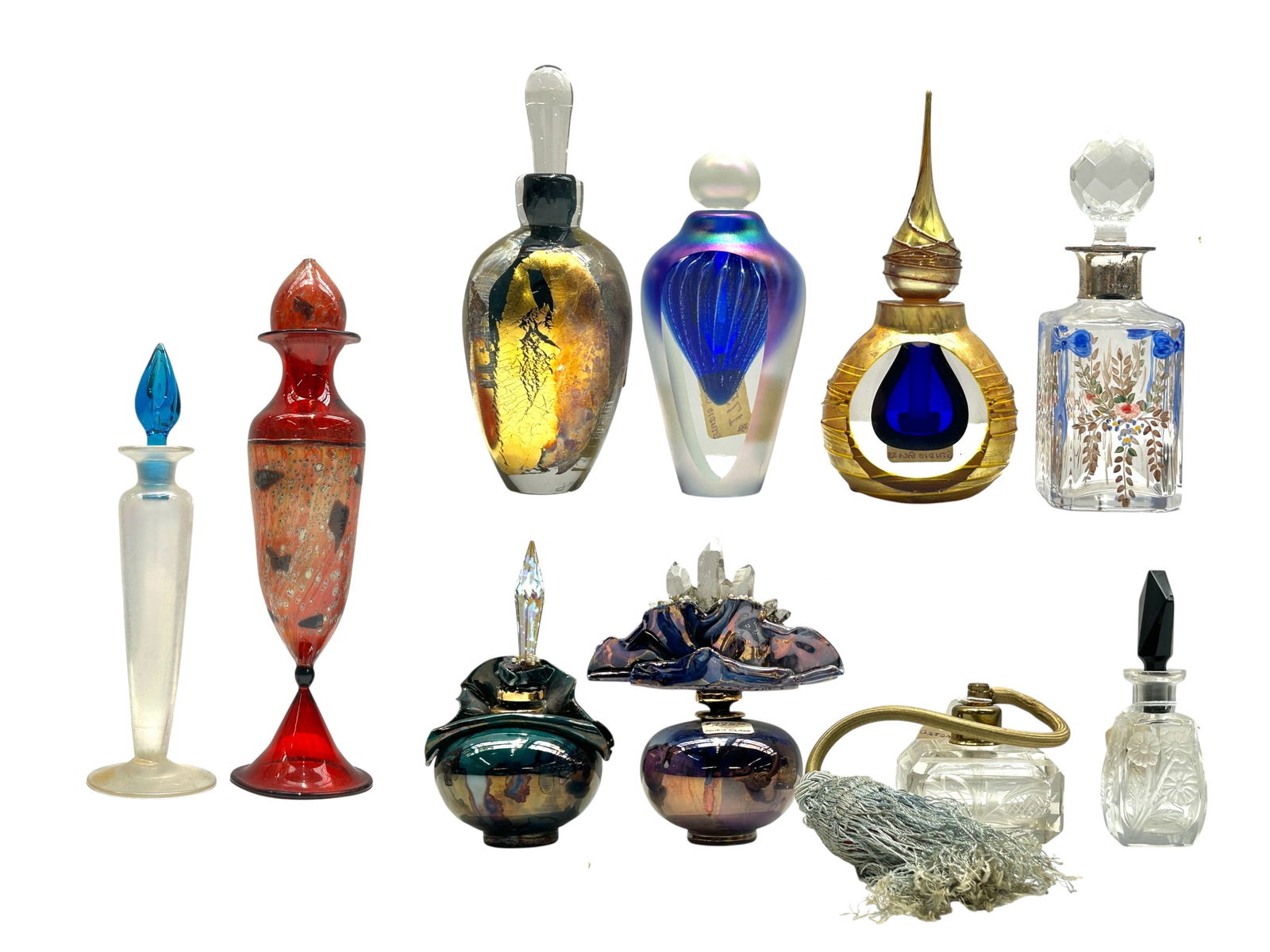 10 Mostly Art Glass Perfume Bottles- Roland, Czech: The lot contains 10 mostly glass scent bottles. Three of the glass bottles are artist signed and dated. The only legible signature is Roland 92. Two of the bottles, which feature crystals and seed