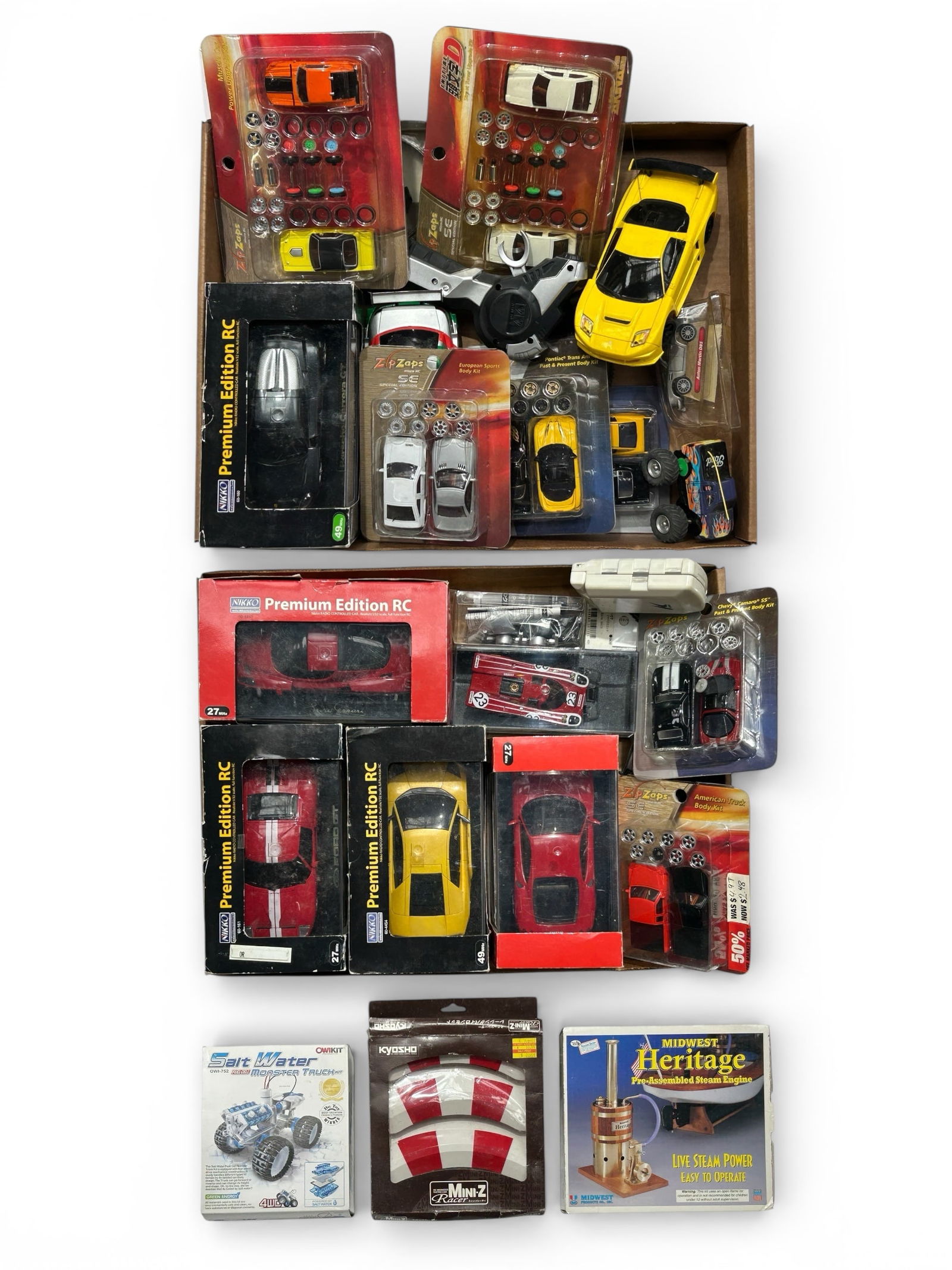 Lot: Nikko RC Cars, Zip Zaps, & Accessories. (1 of 4)