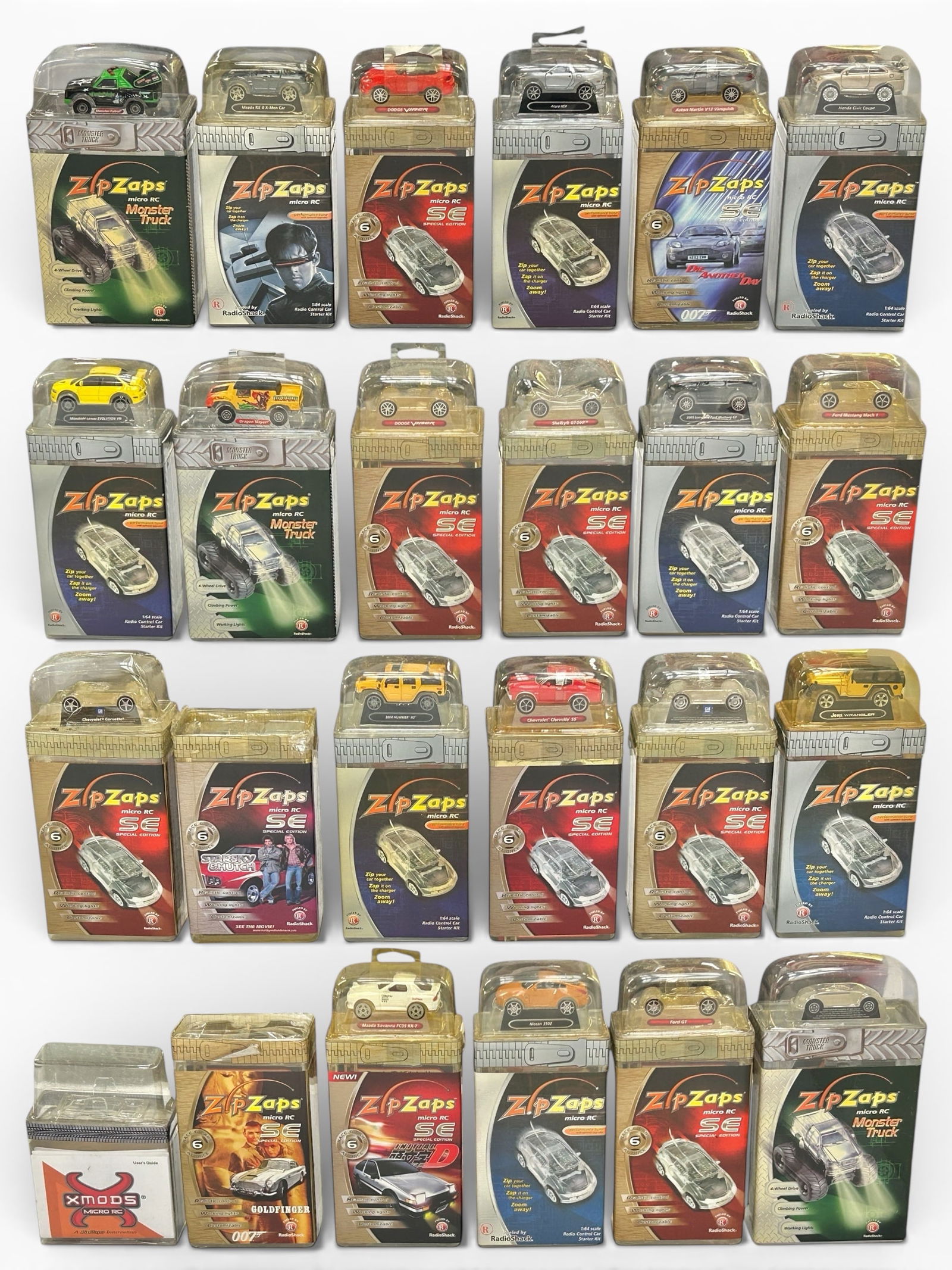 Lot of Zip Zaps Micro RC Remote Control Cars.: Some of the packages look to be incomplete. Overall, the lot looks to be in good condition. Most packages measure 8 7/8" x 4 3/4" x 2 5/8". In-house shipping is available. Please see our website