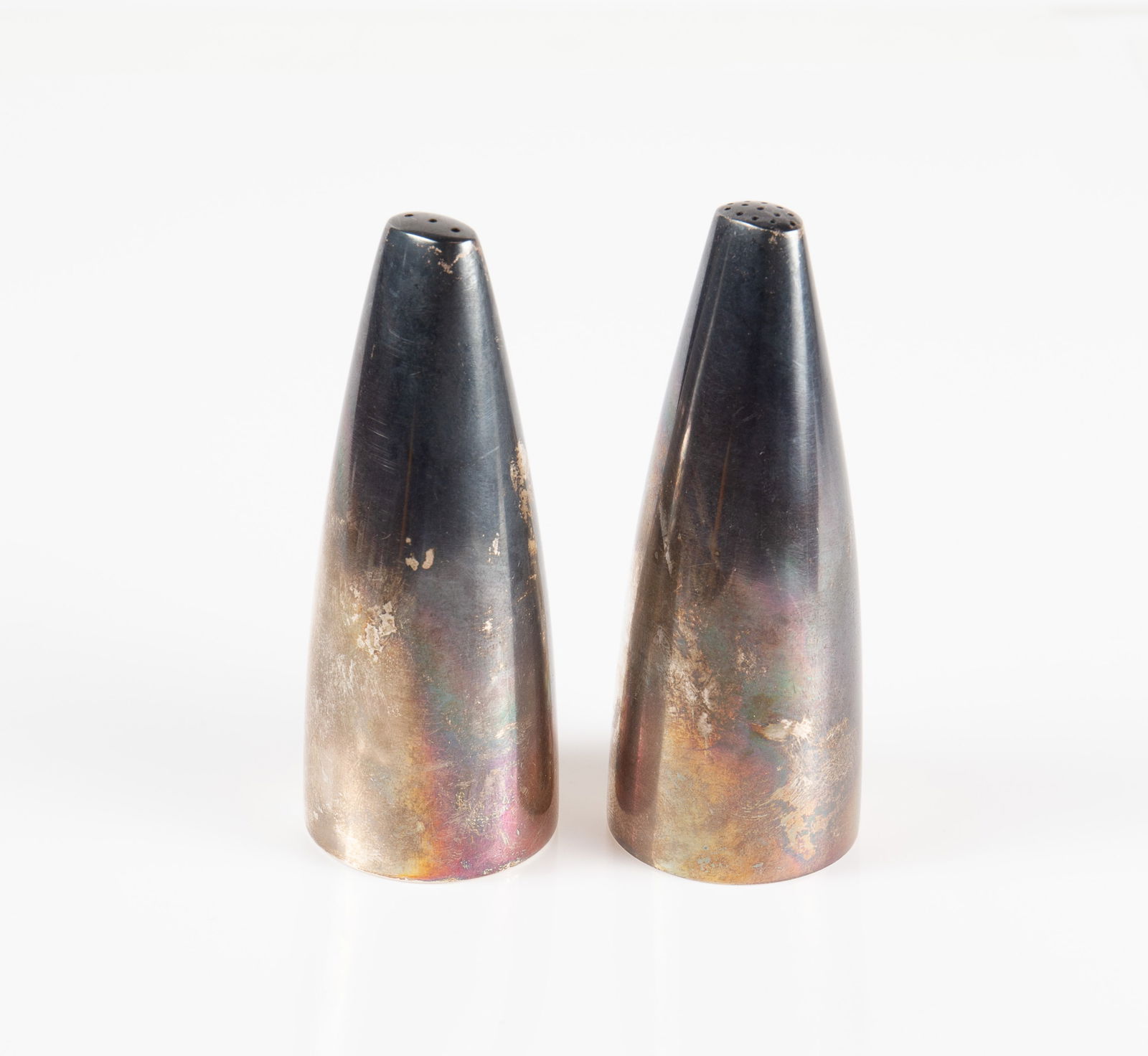 Henning Koppel Georg Jensen Salt & Pepper Shakers.: The undersides are marked Sterling, Georg Jensen, and HK for Henning Koppel. They measure 3 1/4" tall, and up to 1 1/4" wide. They weigh 2.61 Oz. Troy, or 81.2 Grams. The pair has some scratches and t