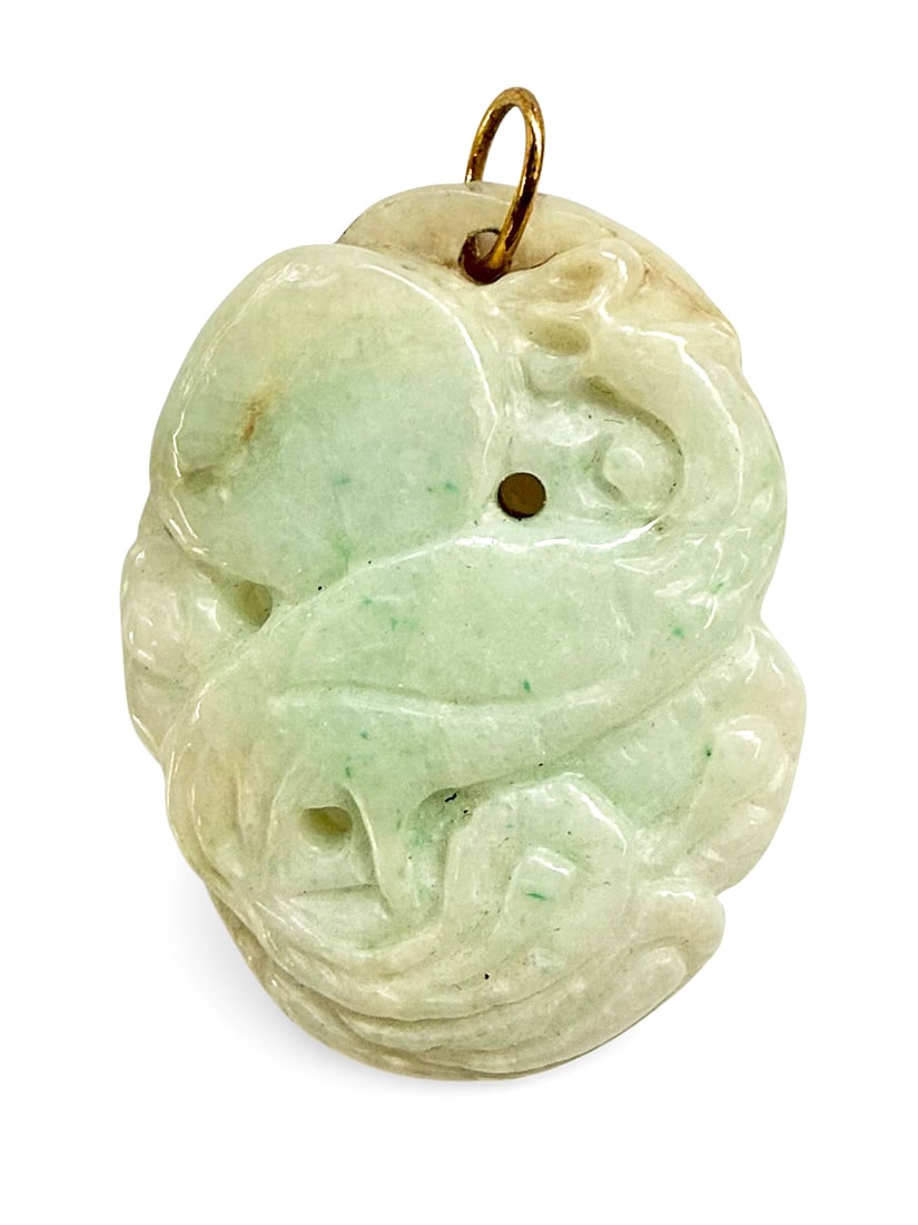 Antique Chinese Carved Jadeite Pendant w/ 14K Bale: The carved and pierced pendant features the image of a bird, possibly a peacock. It measures 1 5/8" x 1 1/4" (not including the bale). It is in overall good condition. In-house shipping is available.