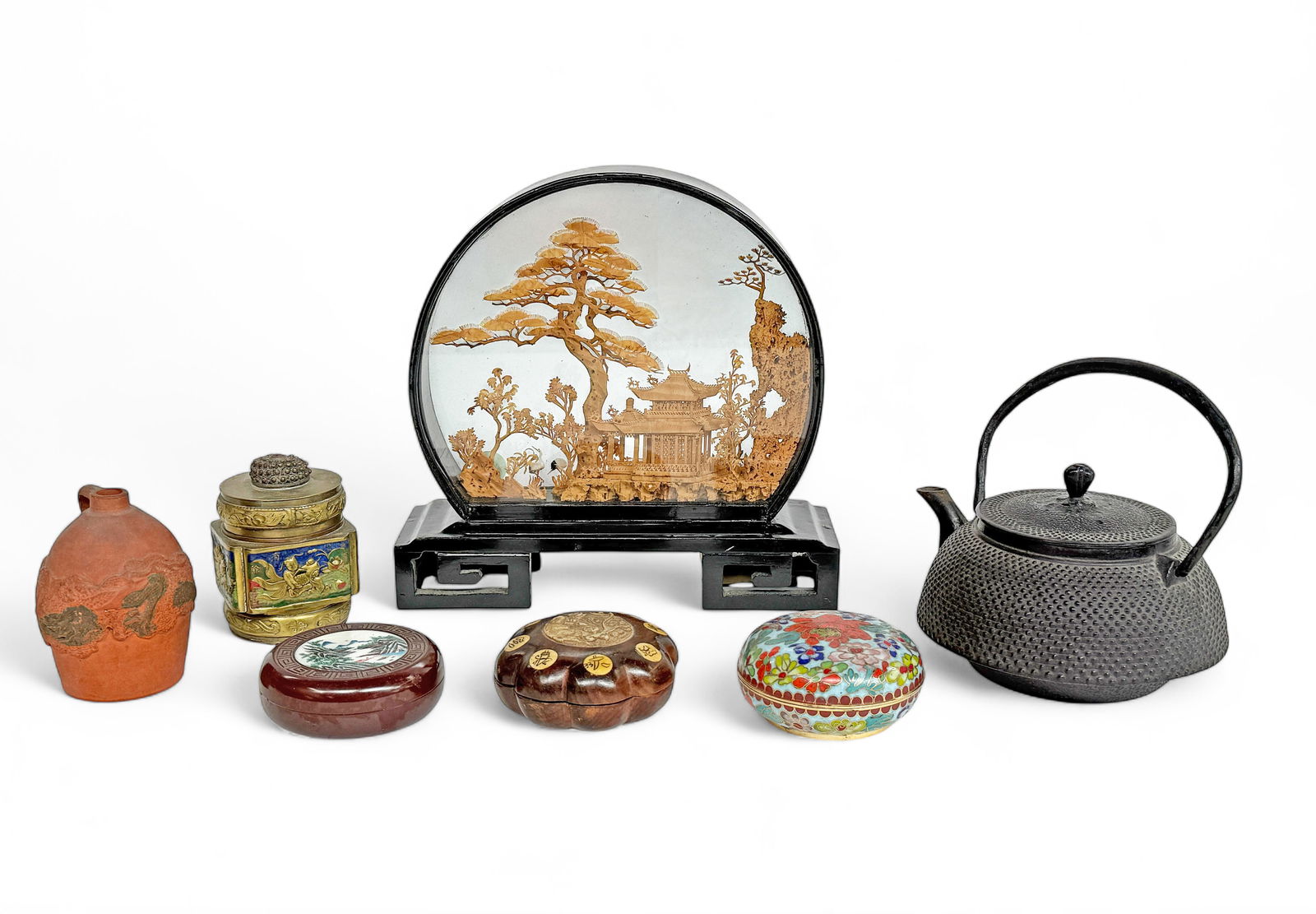 Lot of 7 Assorted Asian Articles.: The lot includes a Chinese cork sculpture, a Japanese iron teapot, a Japanese terra cotta tiny jug, and 2 small Chinese boxes (cloisonne and brass), a Chinese ink container, and a Chinese compass.