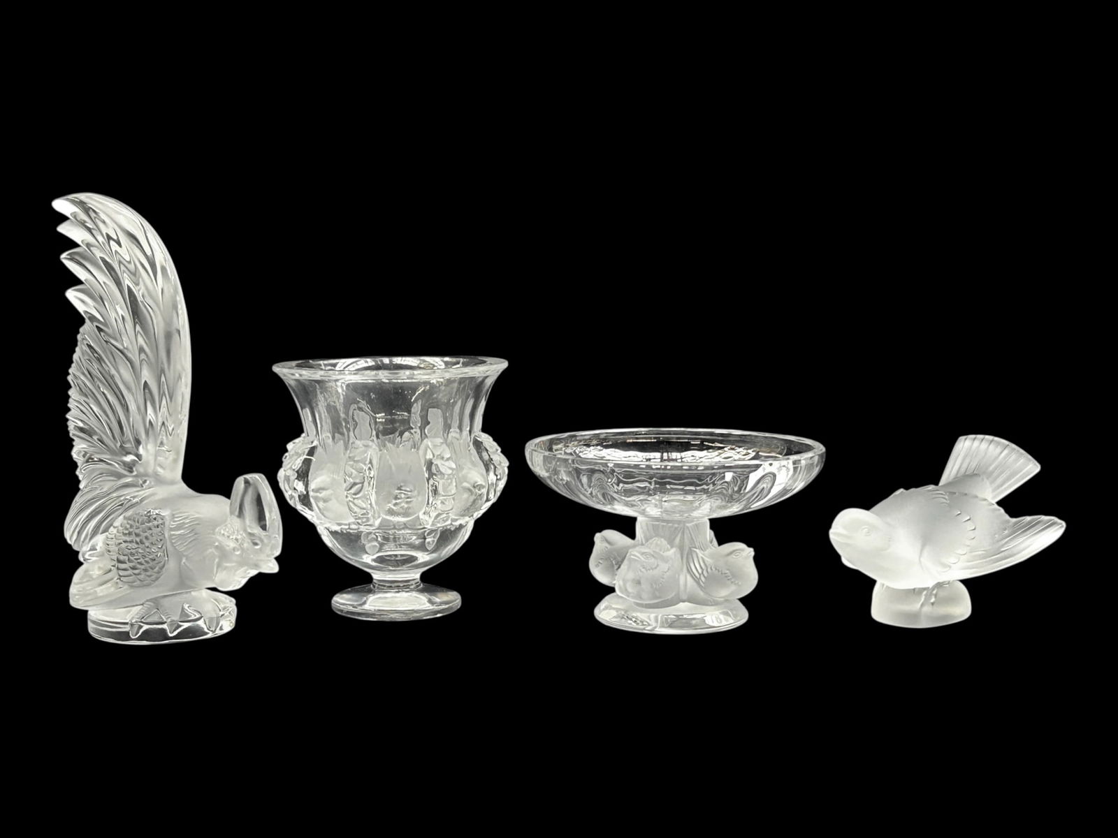 Lot of Lalique France Bird Figurines & Bowls.: This lot includes the following Lalique crystal items: a Nogent sparrow compote, a Dampierre footed vase, a frosted sparrow paperweight, and a rooster figure. Overall, the lot looks to be in nice cond