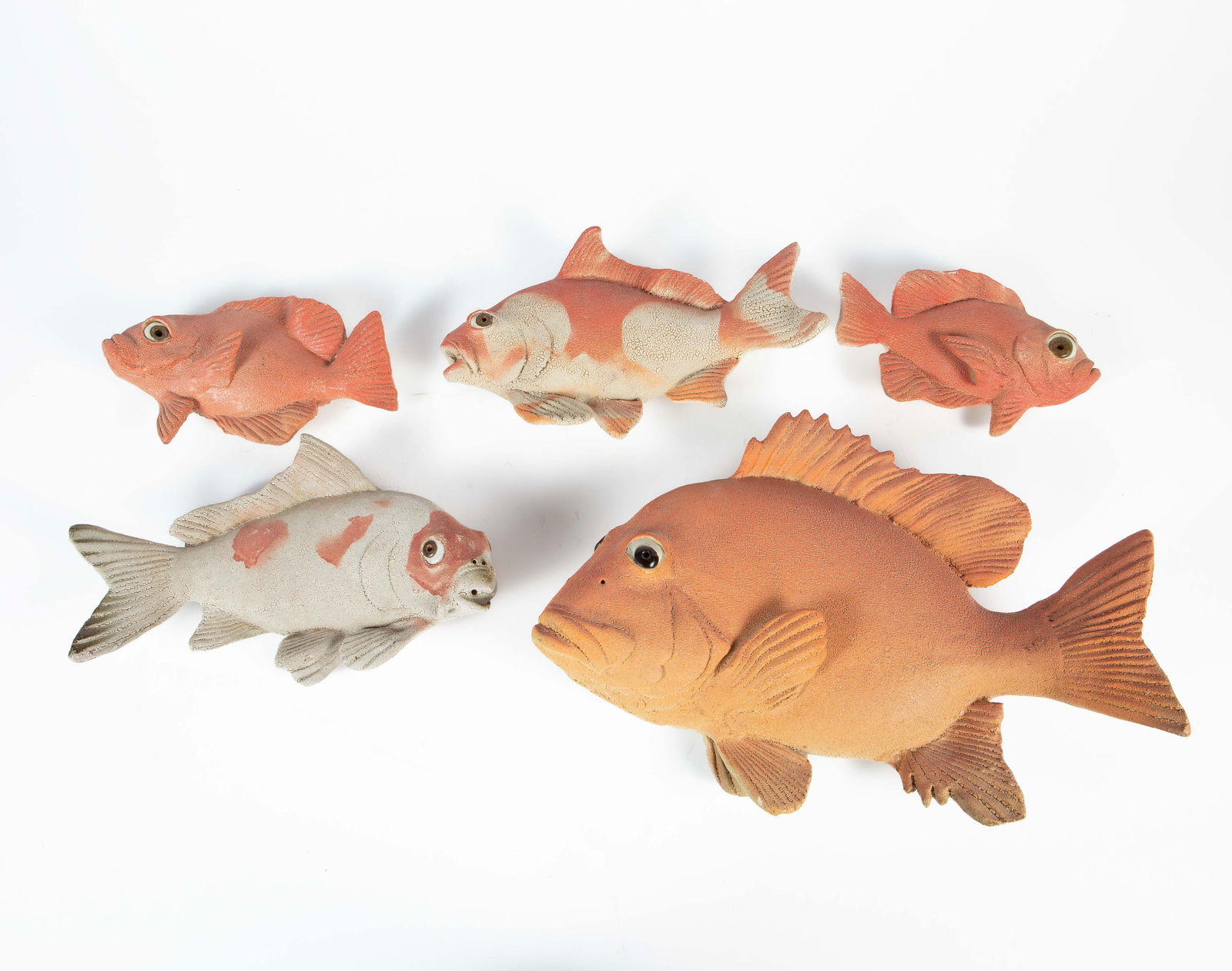 Set of 5 Alan & Rosemary Bennett Fish Sculptures.: The lot looks to be in overall nice cosmetic condition, with some small nicks here and there. The largest fish measures 16 1/4" x 11 1/8" x 4 1/4". The smallest fish measures 8 5/8" x 5 1/2" x 2 3/4".