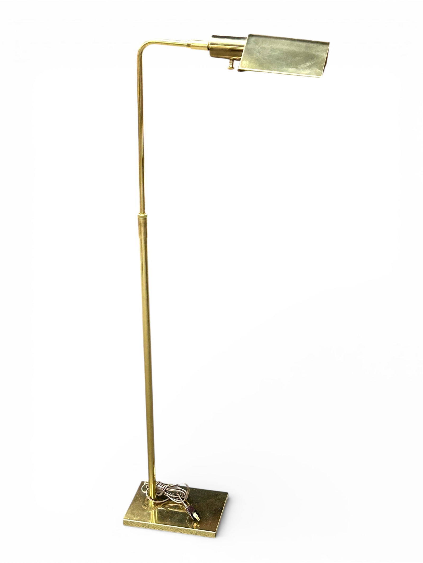 Vintage Koch & Lowy Brass Reading Floor Lamp.: The lamp is adjustable. There are some spots of sticky residue on the base. It measures 47" tall, and is presently working. Third-party freight shipping or personal pickup is required. Please see our