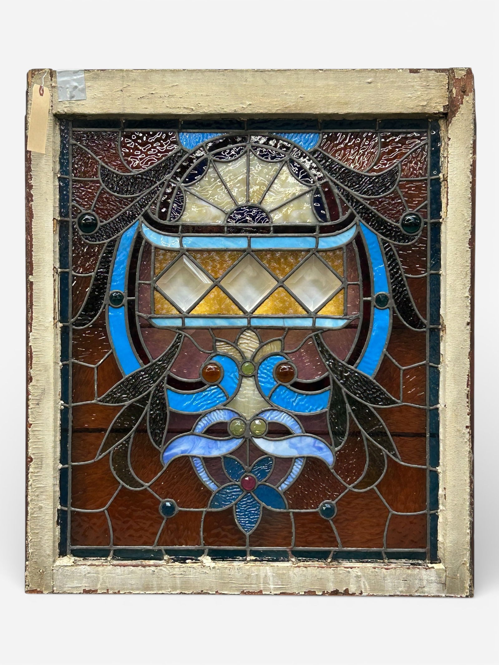 Antique Victorian Stained Glass Window.: This leaded and stained glass window has floral designs, bevelled panels, and rondels. It is in great condition for its age. Its frame measures 35" tall, 30" wide, and 1 3/4" thick. Third-party freigh