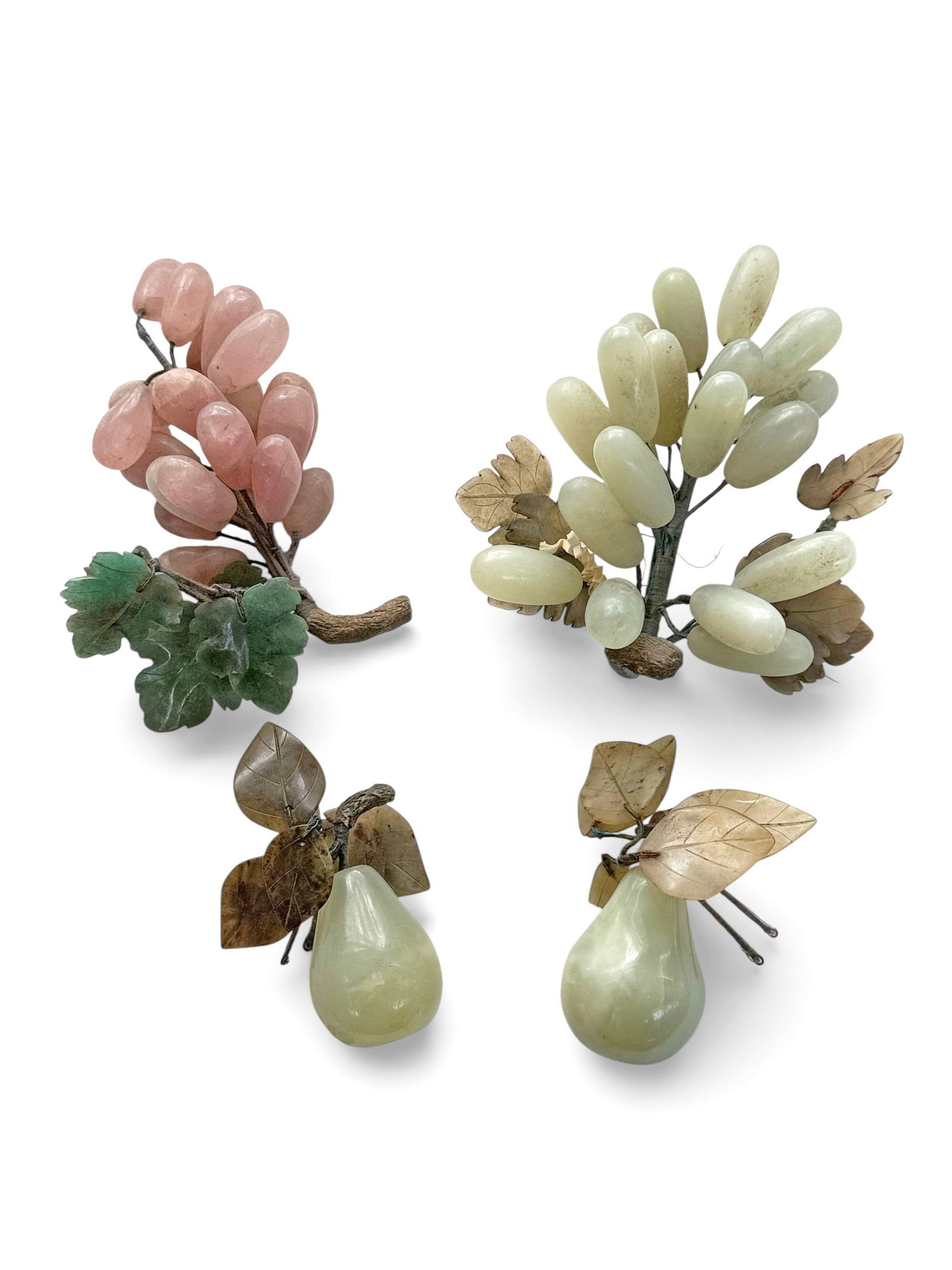 Lot: 4 Pcs.: Jade & Rose Quartz Fruit.: One of the pears has a broken and missing leaves. Otherwise, the items are in good overall condition. The largest item is the jade grapes bunch. It measures 2 1/2" high, 7" long, and 6" wide. The smal
