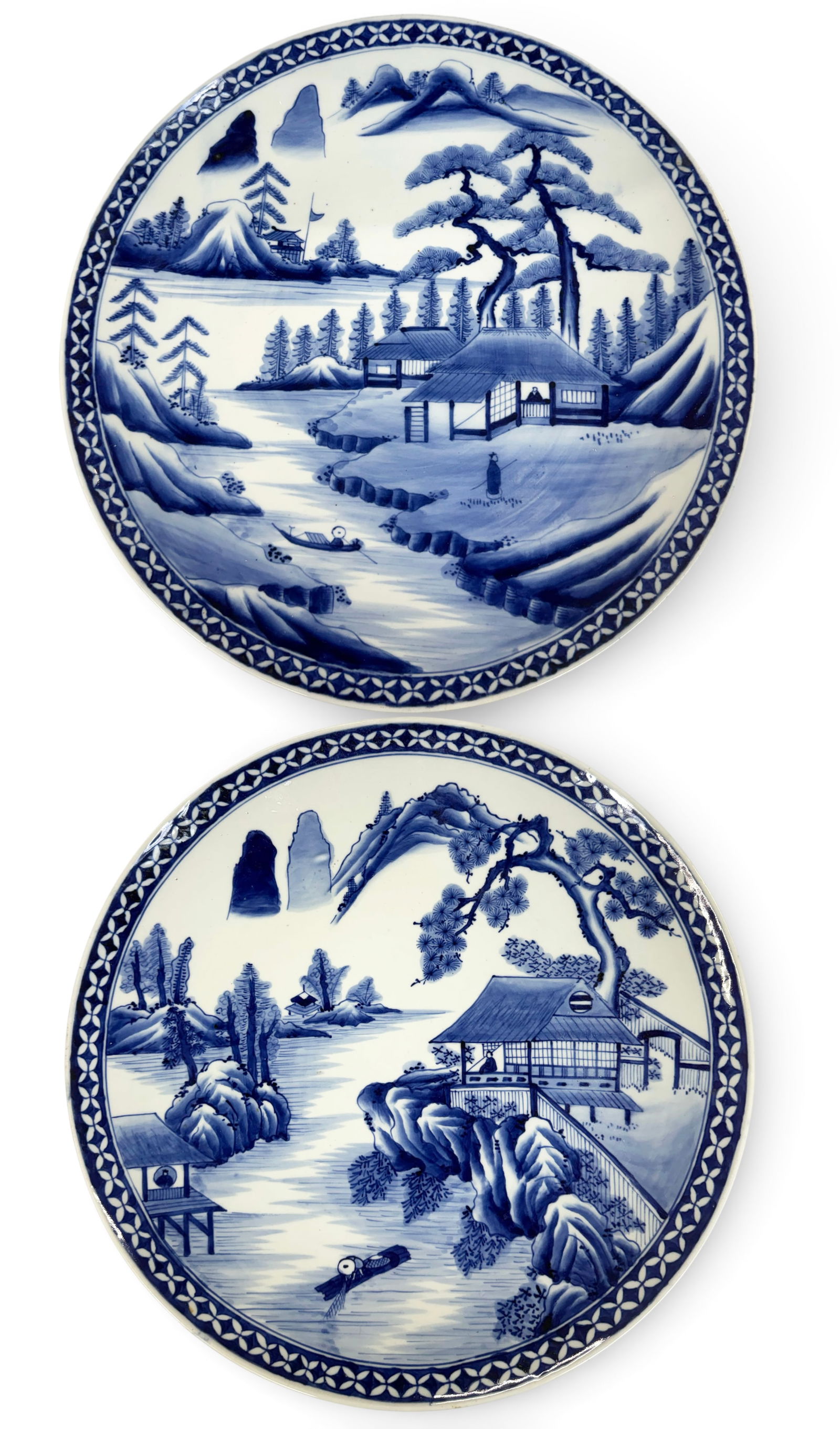 Pair Lg. Japanese Blue & White Porcelain Chargers.: The plates have a few scratches on the front side, but they look to be in good overall condition otherwise. Each measures 2 3/8" tall and 18" in diameter. In-house shipping is available. Please see ou
