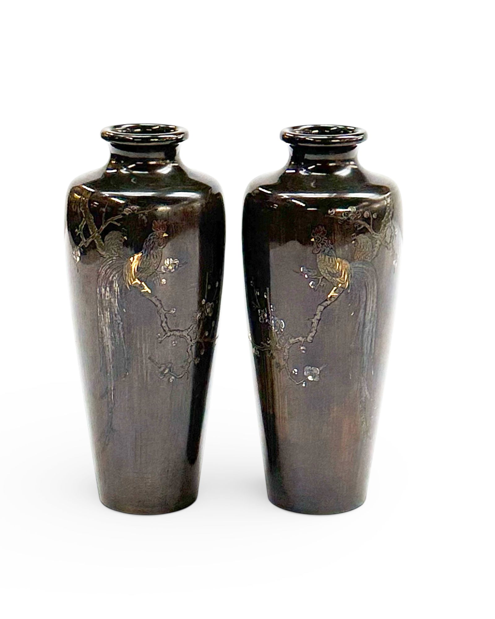 Pair of Japanese Meiji Period Bronze Inlaid Vases.: They might possibly be inlaid with small areas of silver and gold. They are unsigned. The pair look to be in good overall condition. Each measures 7 1/8" tall and 3" in diameter. In-house shipping is