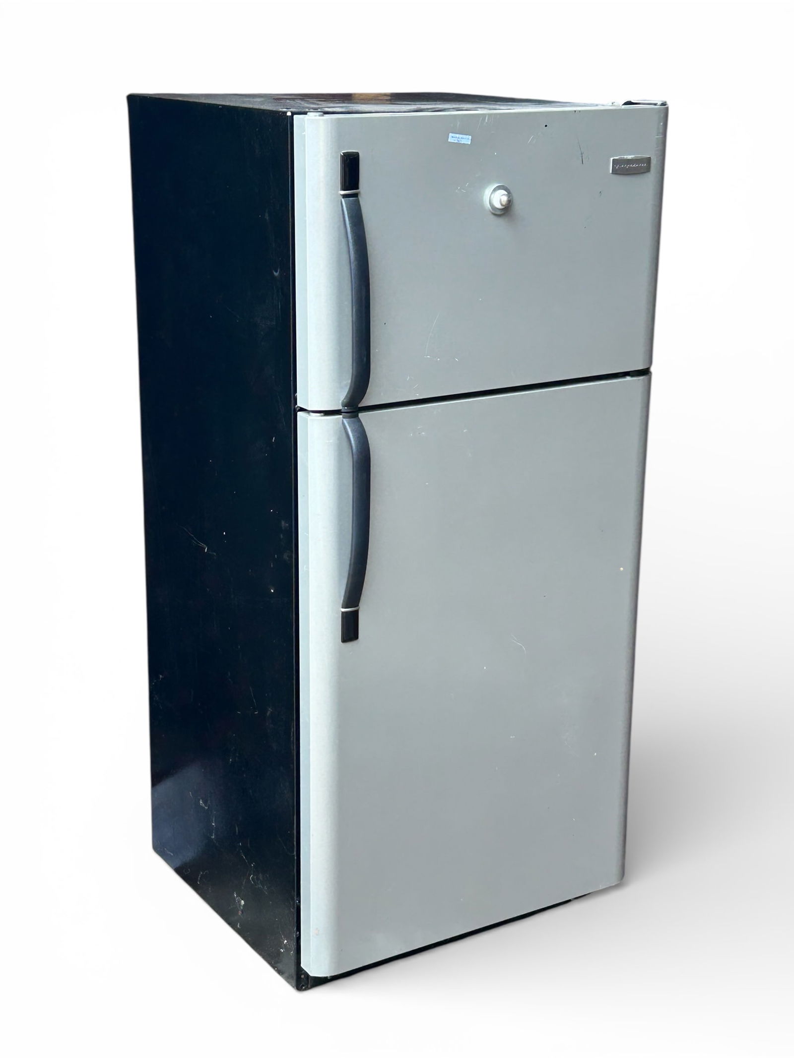 Frigidaire Stainless Steel Refrigerator.: The model number for the refrigerator is FRT8G6FMB4. It works, but needs a good cleaning. It measures 30" wide, 33" deep, and 65 1/2" tall. Third-party freight shipping or personal pickup is required.