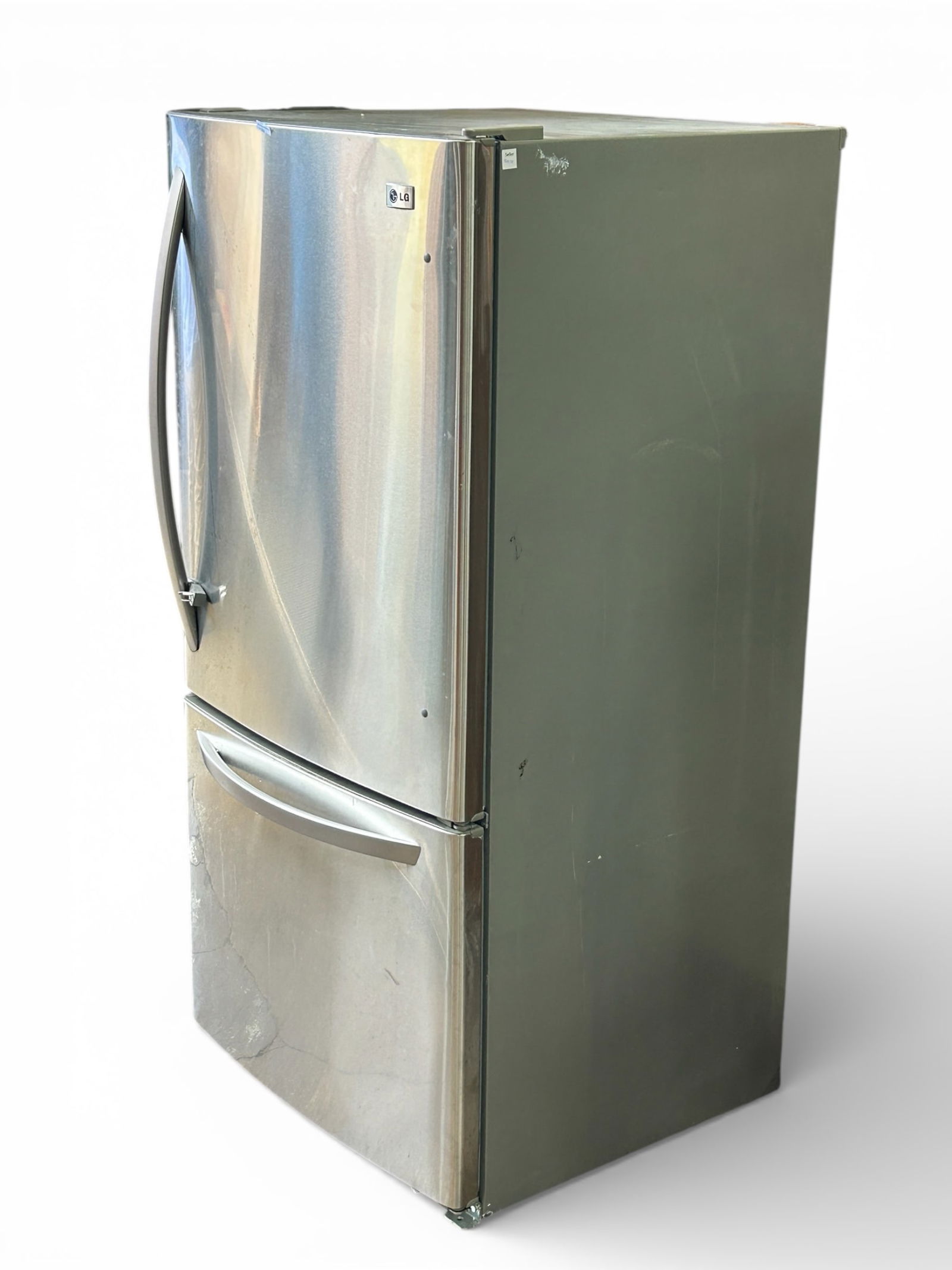 LG Stainless Steel Refrigerator.: The model number is LBC22520ST. It is working. Both the refrigerator and freezer sections are very dirty, and need to be thoroughly cleaned before use. The refrigerator measures 32.8" wide, 32.2" deep