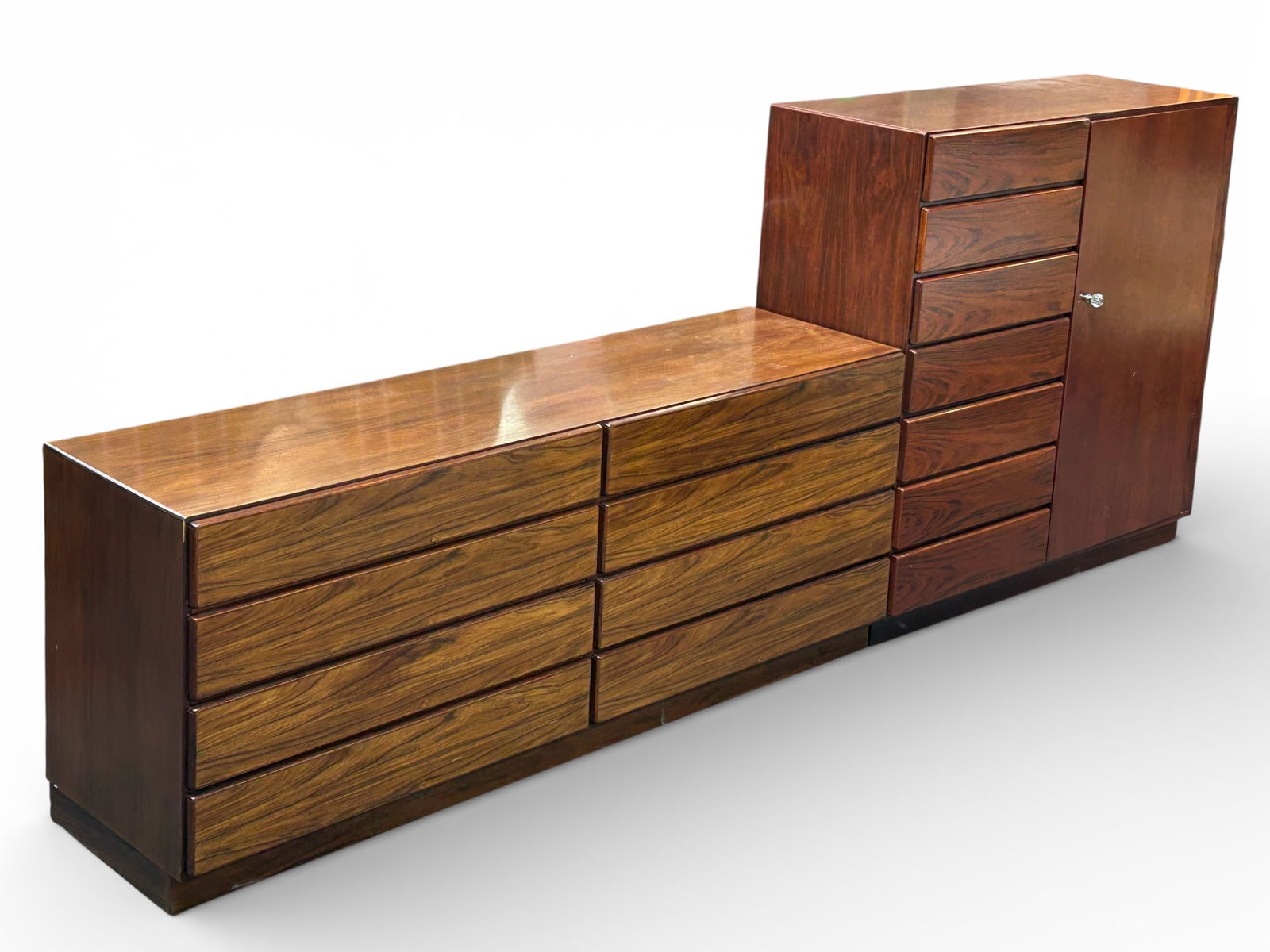 Mid Century Rosewood Dresser & Genteman's Chest.: Both of these Mid-Century Modern pieces are made from rosewood, though the dresser is more yellow in tone. The dresser has eight wide drawers. The drawers on the left side do not open as smoothly as t