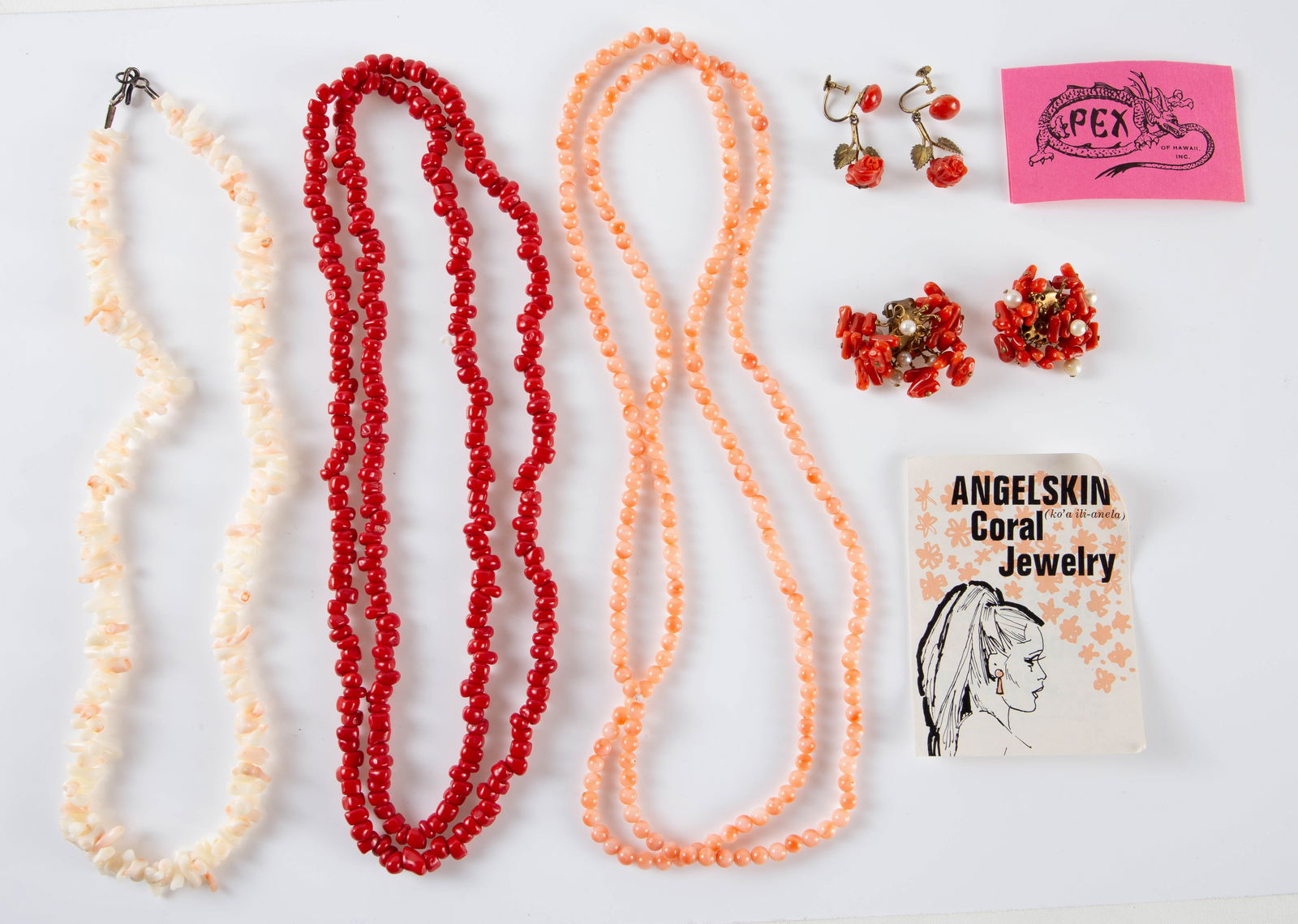 Coral Jewelry, inc. Silver Carved Rose Earrings.: The lot contains 5 pieces of coral jewelry. There are 3 necklaces and 2 pair of earrings. The necklaces are an angel skin coral short branch piece from Hawaii, a long spherical bead salmon coral neckl