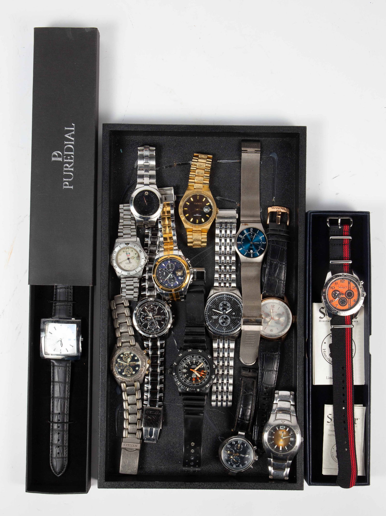 14 Mens' Watches - Chrono, Invicta, Puredial, Etc.: The lot contains 14 newer mens' wristwatches, including a couple of unused watches in their boxes. The new items are Stauer 27126, with a black and red band, and a Puredial Square Legacy watch with a