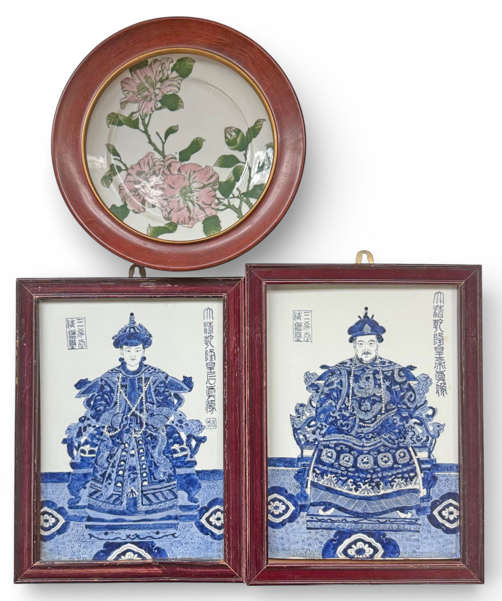 Asian Porcelain Pair of Plaques & Framed Plate.: The Chinese plaques are blue and white porcelain, with images of an Emporer and Empress. Also included is a framed floral Japanese plate, which is signed on the back. The frame in which the plate rest