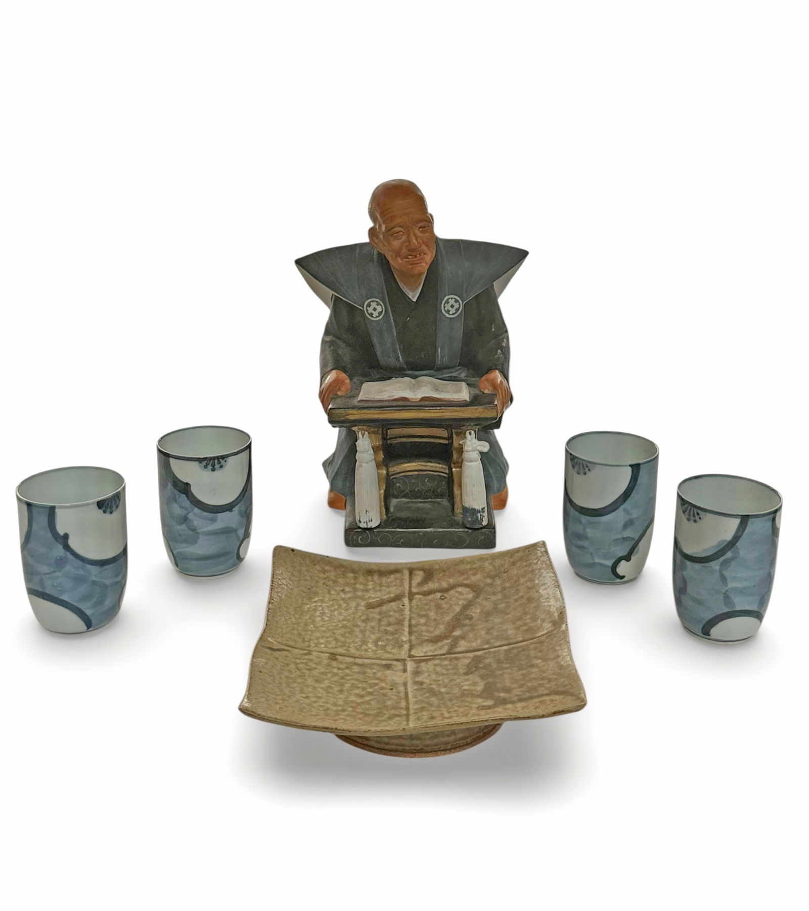 Lot of 6 Japanese Pottery / Porcelain Items.: The lot includes 4 signed vintage porcelain cups, a square pottery compote, and a clay Hakata doll of a master teacher of scholar (possibly by Urasaki). The Hakata doll is missing a crossbar in the fr