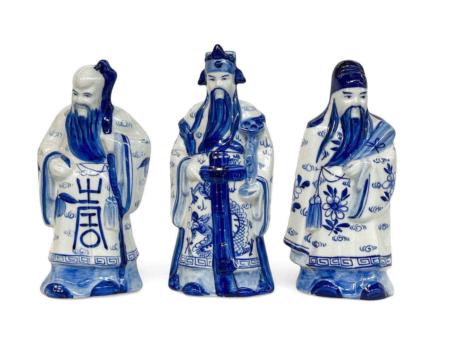 Set of 3 Chinese Blue & White Porcelain Immortals.: All of the Immortal figures look to be in good overall condition. They are known as the Sanxing, or "Three Stars", representing prosperity, status, and longevity. The tallest of the three measures 9 1