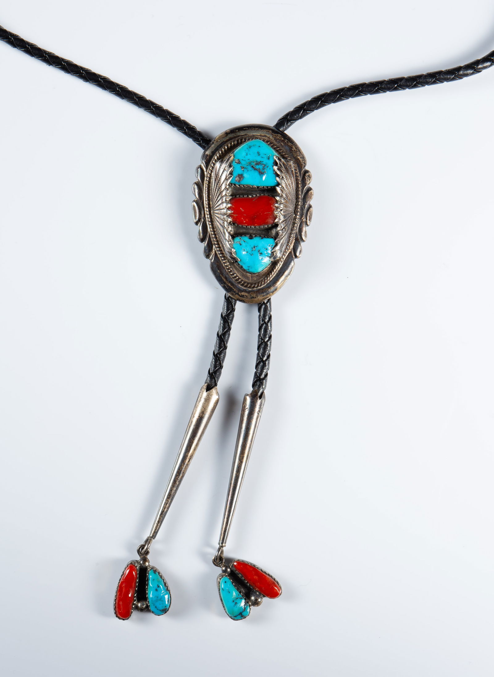 Zuni Sterling Turquoise & Coral Bolo Tie, Leekya.: The Southwestern Native American Indian bolo tie is marked RLB Sterling on the back for Robert & Bernice Leekya. The slide features a couple of sleeping beauty turquoise stones and a coral stone