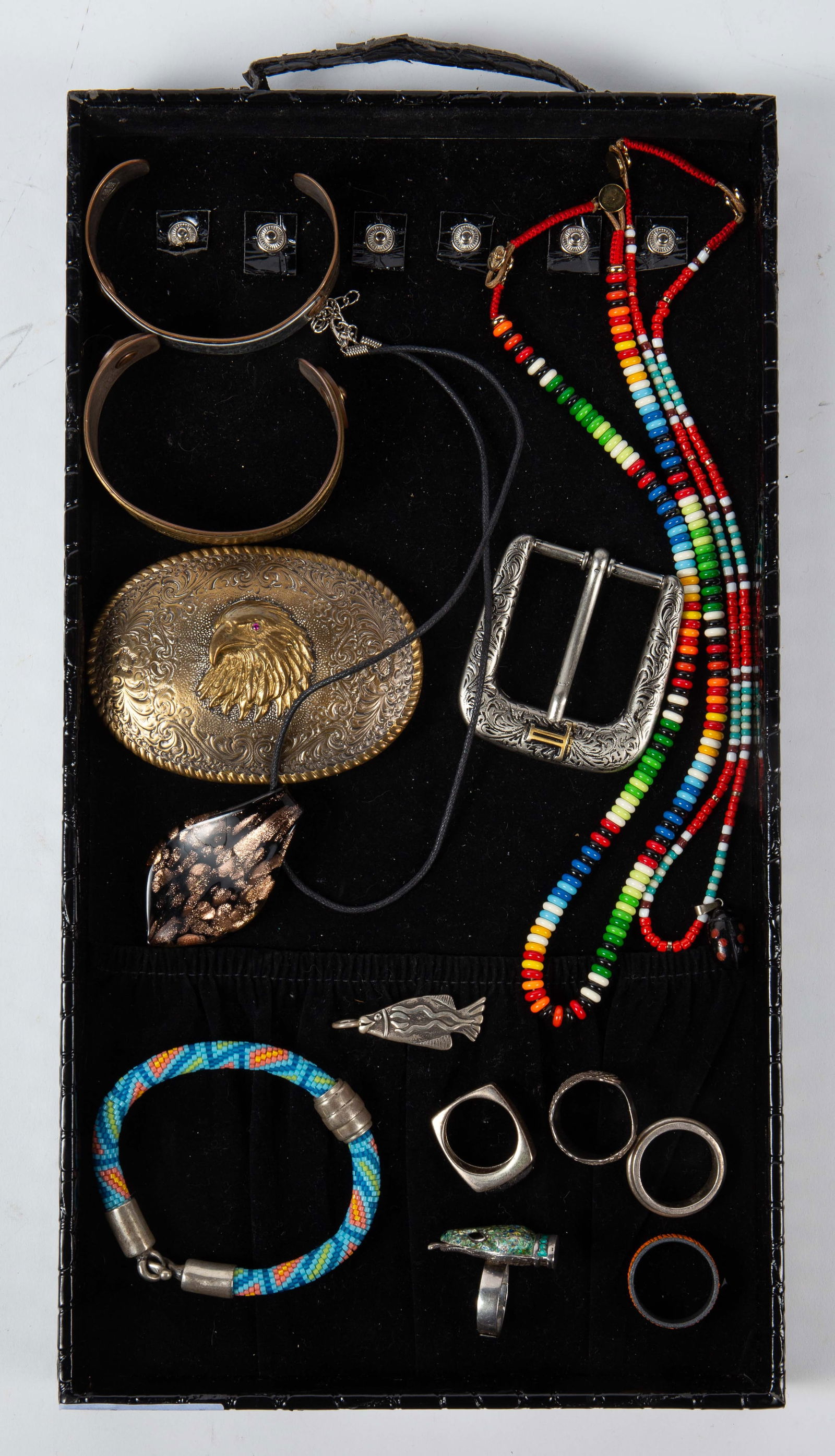 Lot Jewelry - 925, Assoulin, Crumrine, Margot.: The lot contains 13 pieces of jewelry. There are 2 Roxanne Assoulin multicolor beaded necklaces, a Margot de Taxco sterling and enamel snake ring, 3 sterling mens' rings, a sterling fish pendant, a
