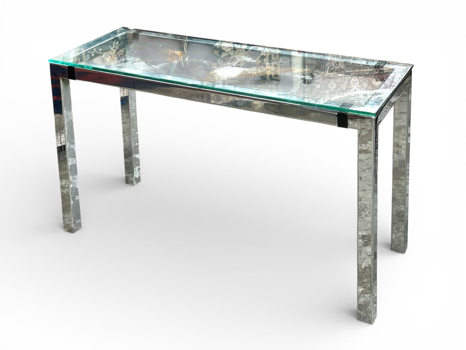 Modern Chrome and Glass Console Table.: The table has a chrome base with a removable glass top that sits on leather straps .It is in good condition, with some minor wear. The table measures 48" wide, 18" deep, and 29" tall. Third-party frei