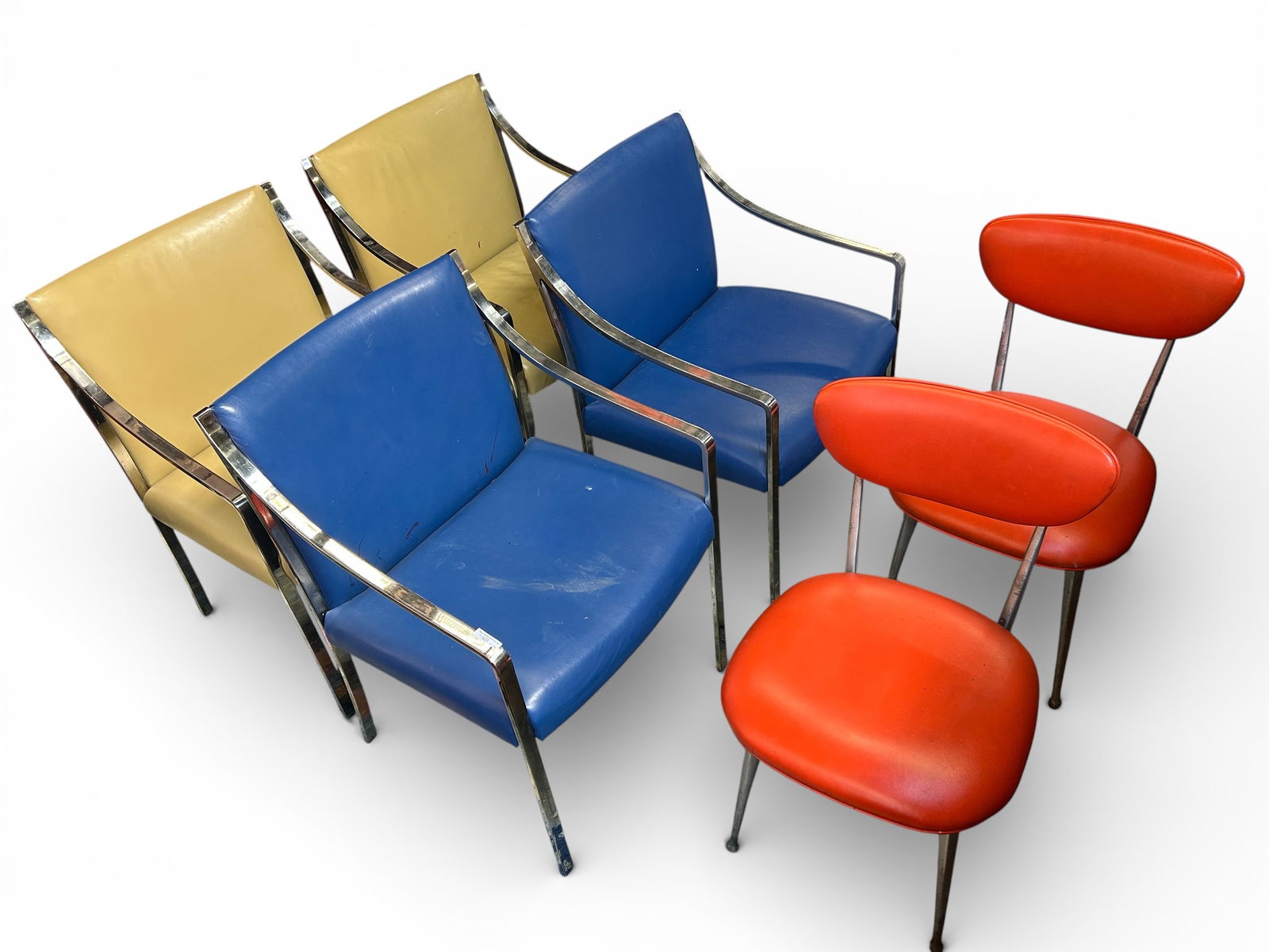 4 Mid-Century Modern Armchairs & 2 Side Chairs.: Included in the lot are four Milo Baughman style chairs that have chrome arms and legs and (faux?) leather upholstery. Two of these are blue and two are tan colored. The side chairs have their origina