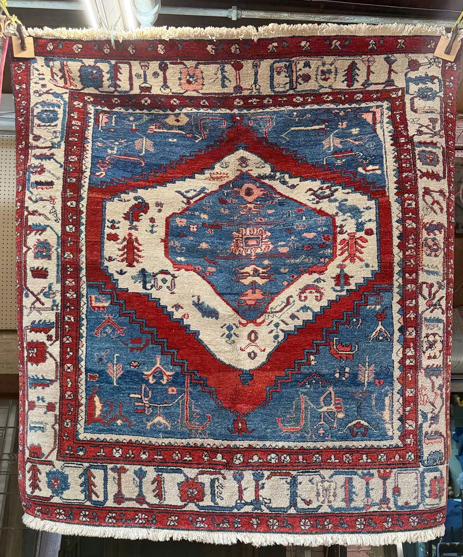6' 3" x 6' 5" Azeri Brand Turkish Rug.: The rug has a few wool threads sticking out, but looks to be in good overall condition. It has a tag on the back from Azeri Rugs. In-house shipping is available for this rug. Please see our website